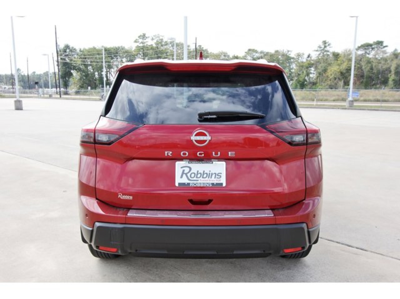 2026 Nissan Rogue SV Red at Robbins Nissan