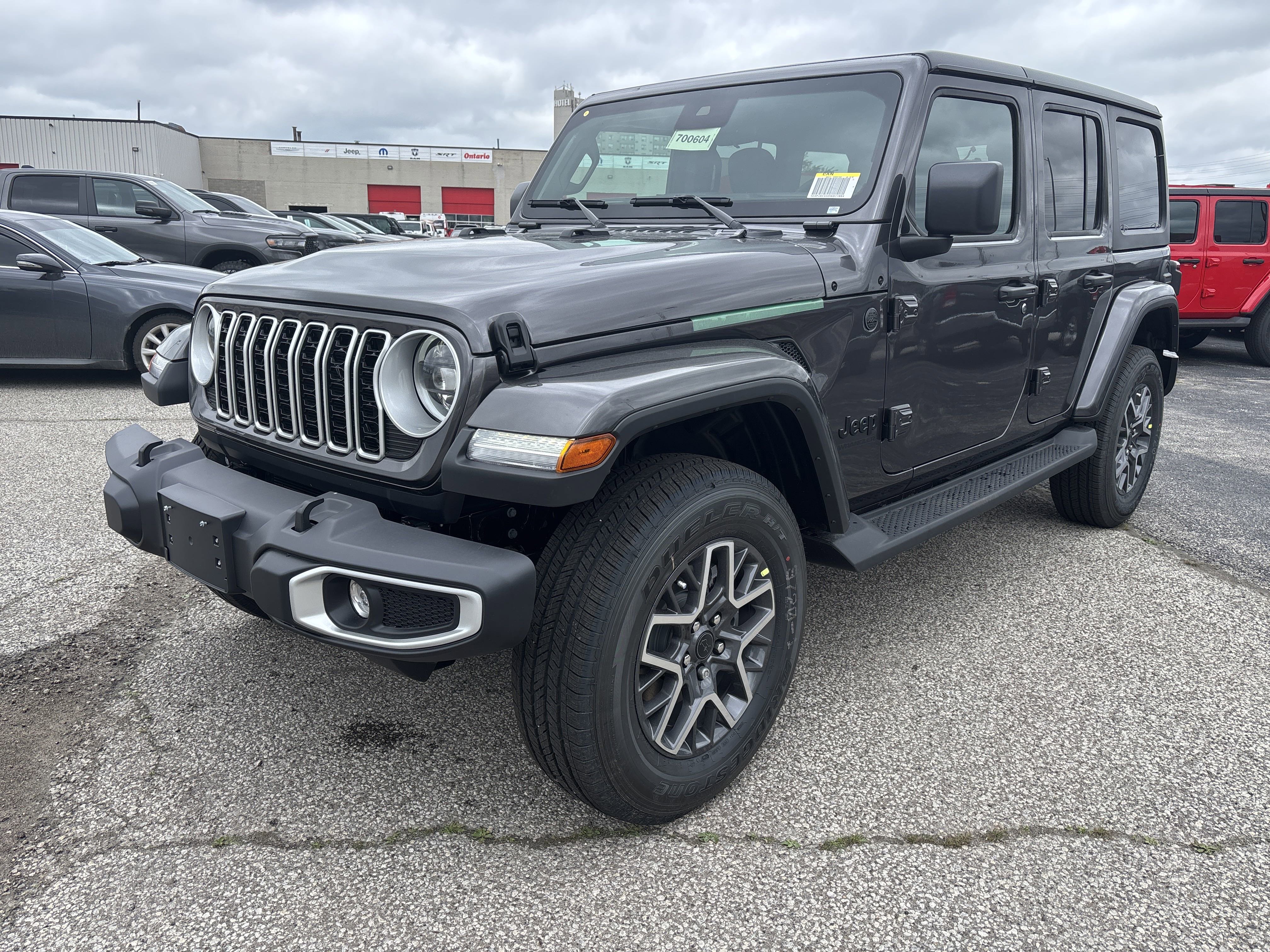New 2025 Granite Crystal Metallic Jeep Sahara image 1