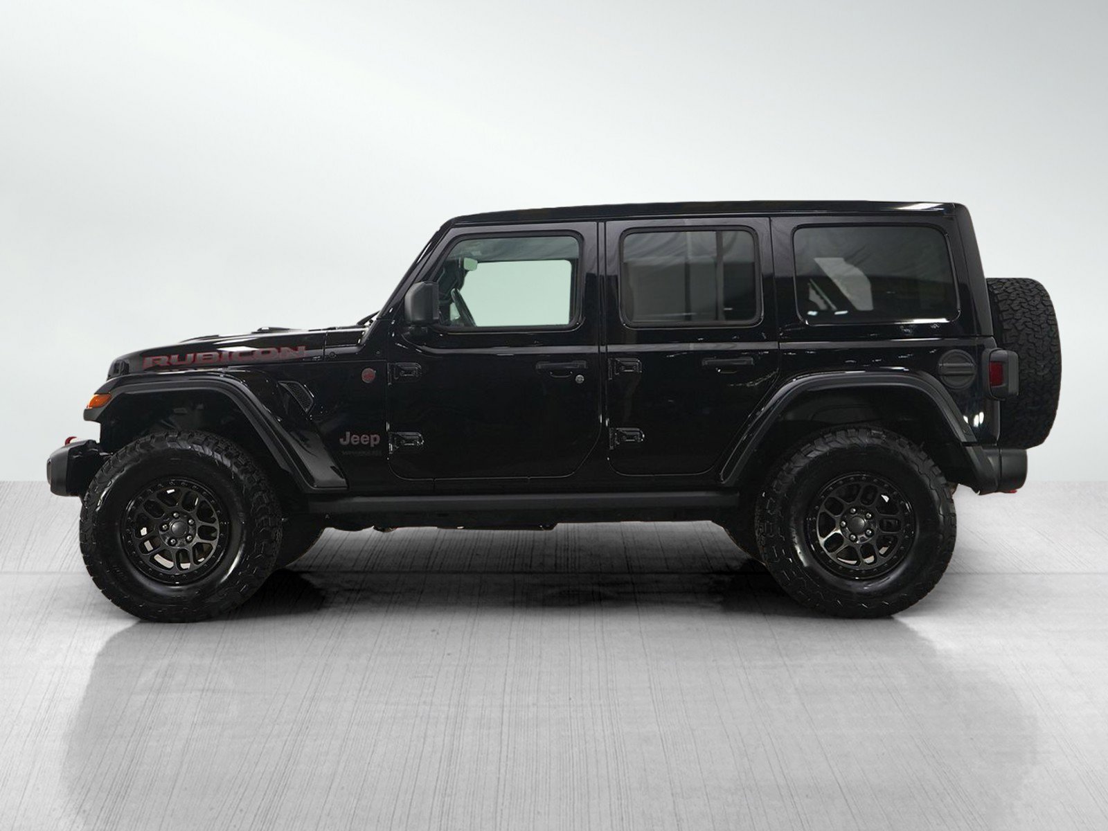 Used 2021 Jeep Wrangler Unlimited Rubicon with VIN 1C4JJXFGXMW838876 for sale in Hopkins, Minnesota