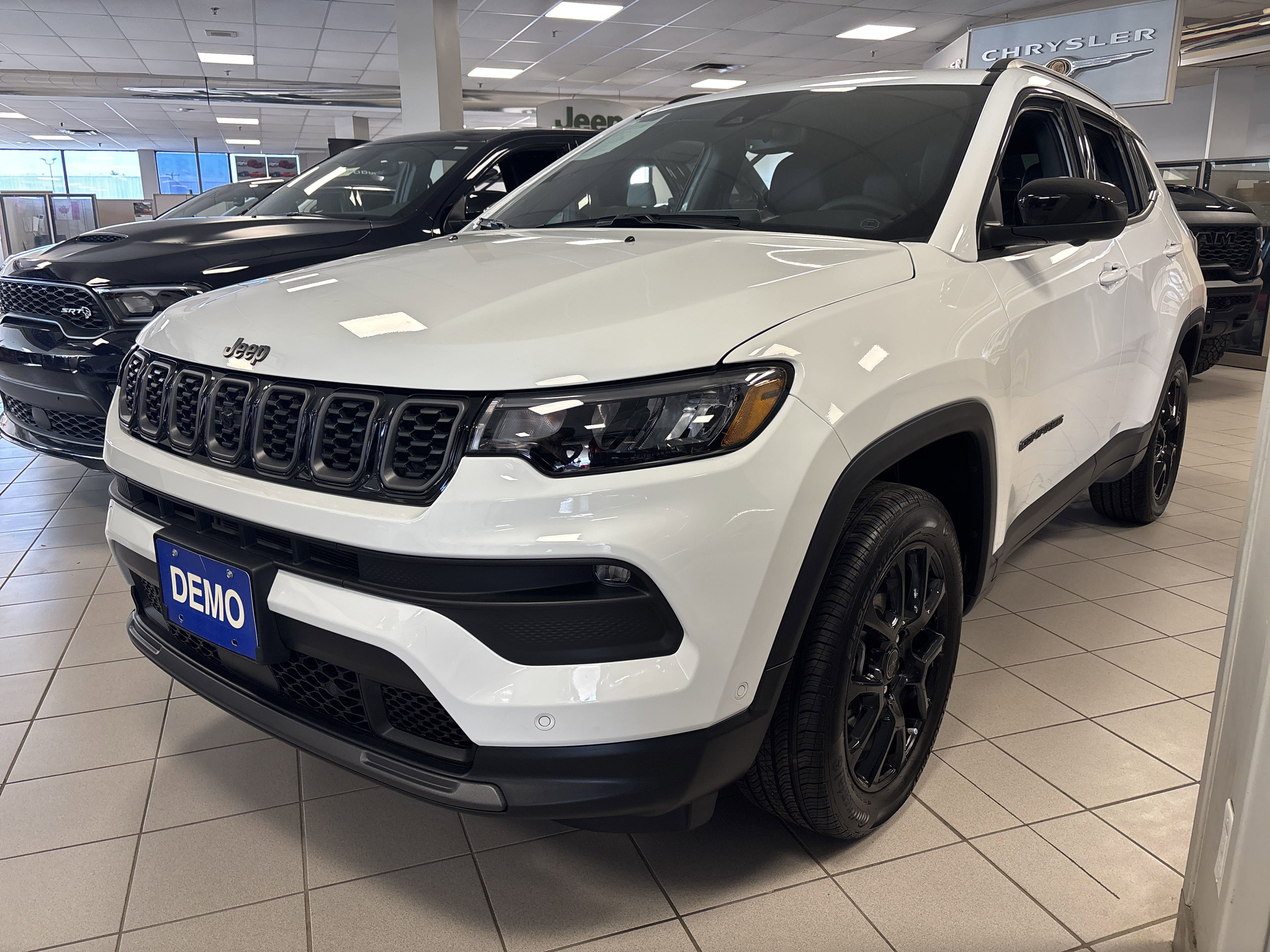 Used 2025 Bright White Jeep Altitude image 1