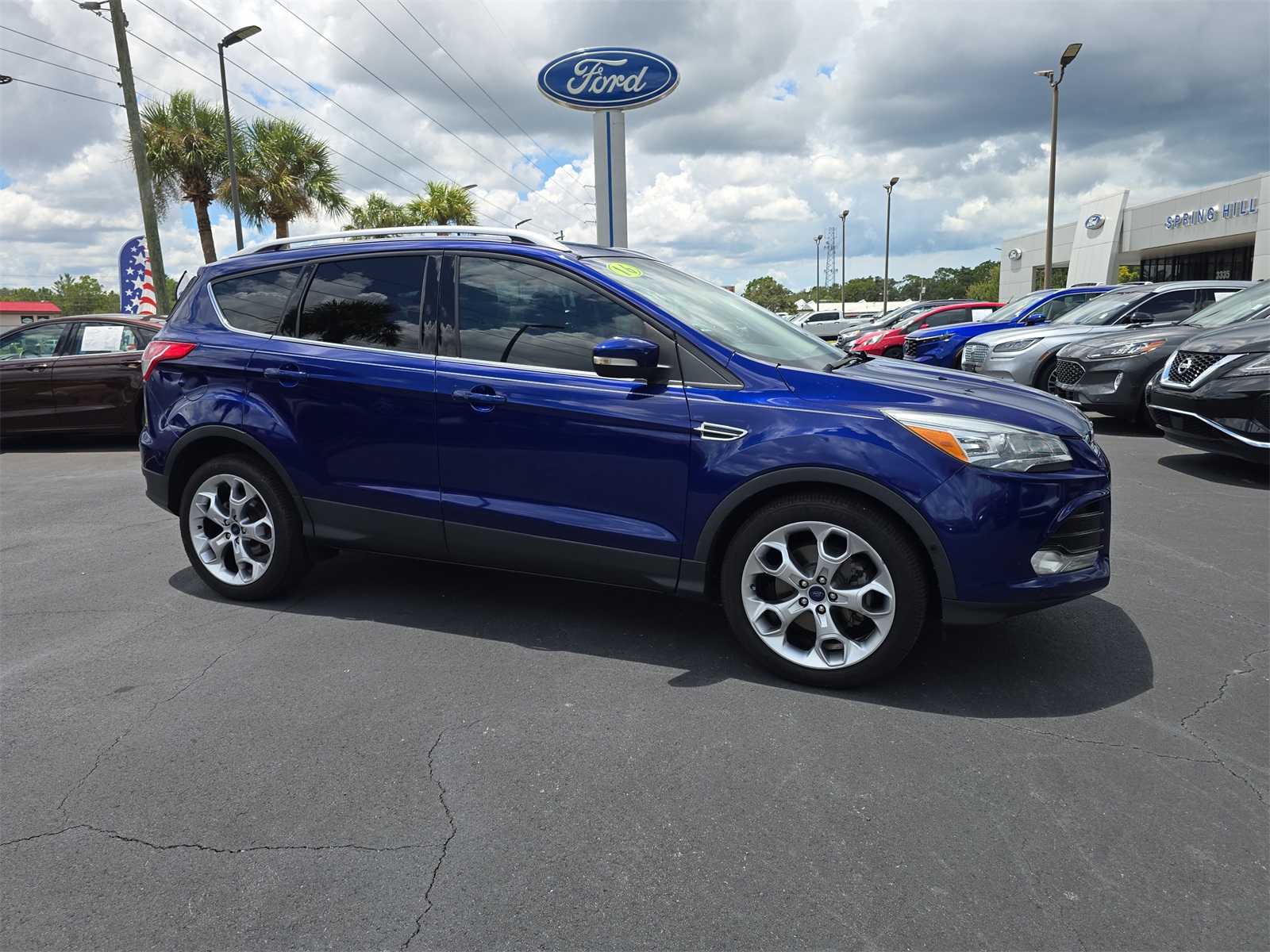Used 2016 Ford Escape Titanium with VIN 1FMCU0J92GUB52990 for sale in Spring Hill, FL