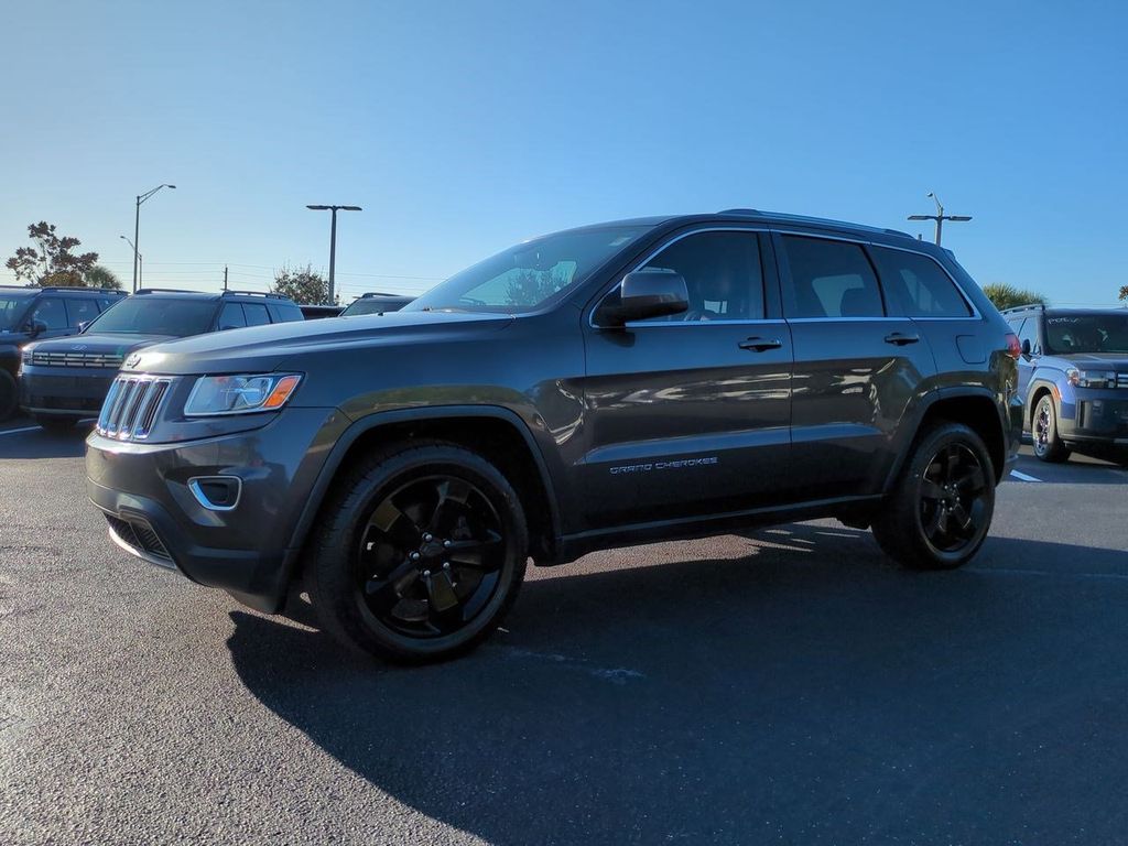 Used 2014 Jeep Grand Cherokee Laredo with VIN 1C4RJEAG8EC573263 for sale in Bradenton, FL