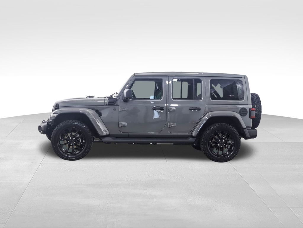 Used 2021 Jeep Wrangler Unlimited Sahara 4XE with VIN 1C4JJXP65MW861181 for sale in Minneapolis, Minnesota