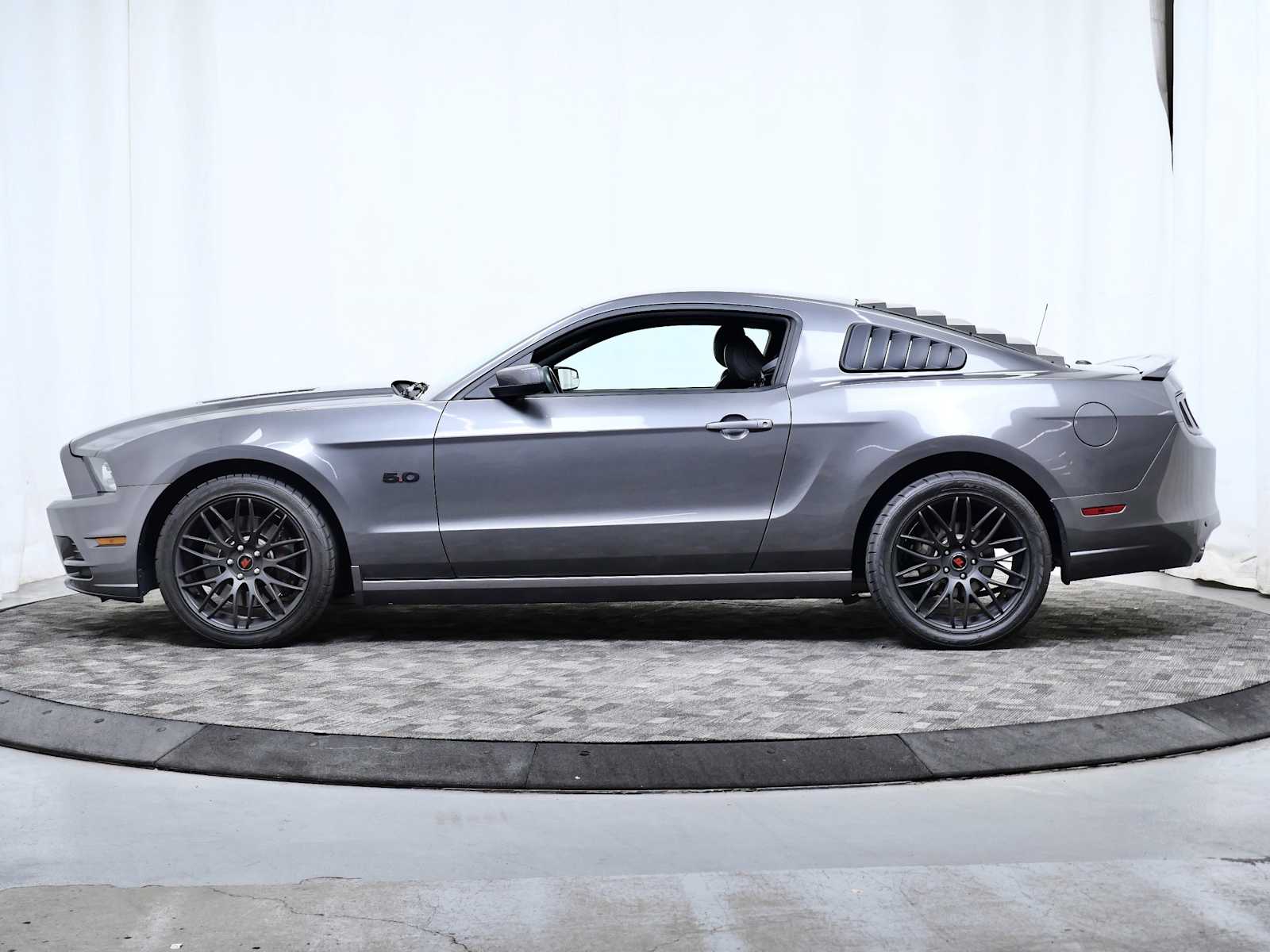 Used 2013 Ford Mustang GT Premium with VIN 1ZVBP8CF7D5202486 for sale in Minneapolis, Minnesota