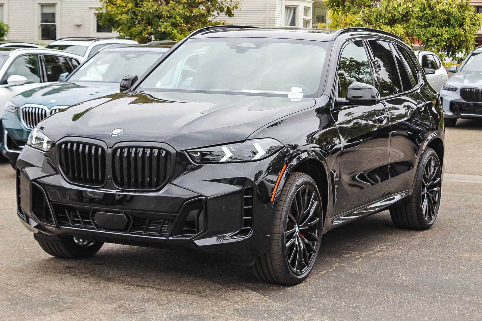 New 2026 Black Sapphire Metallic BMW sDrive40i image 3