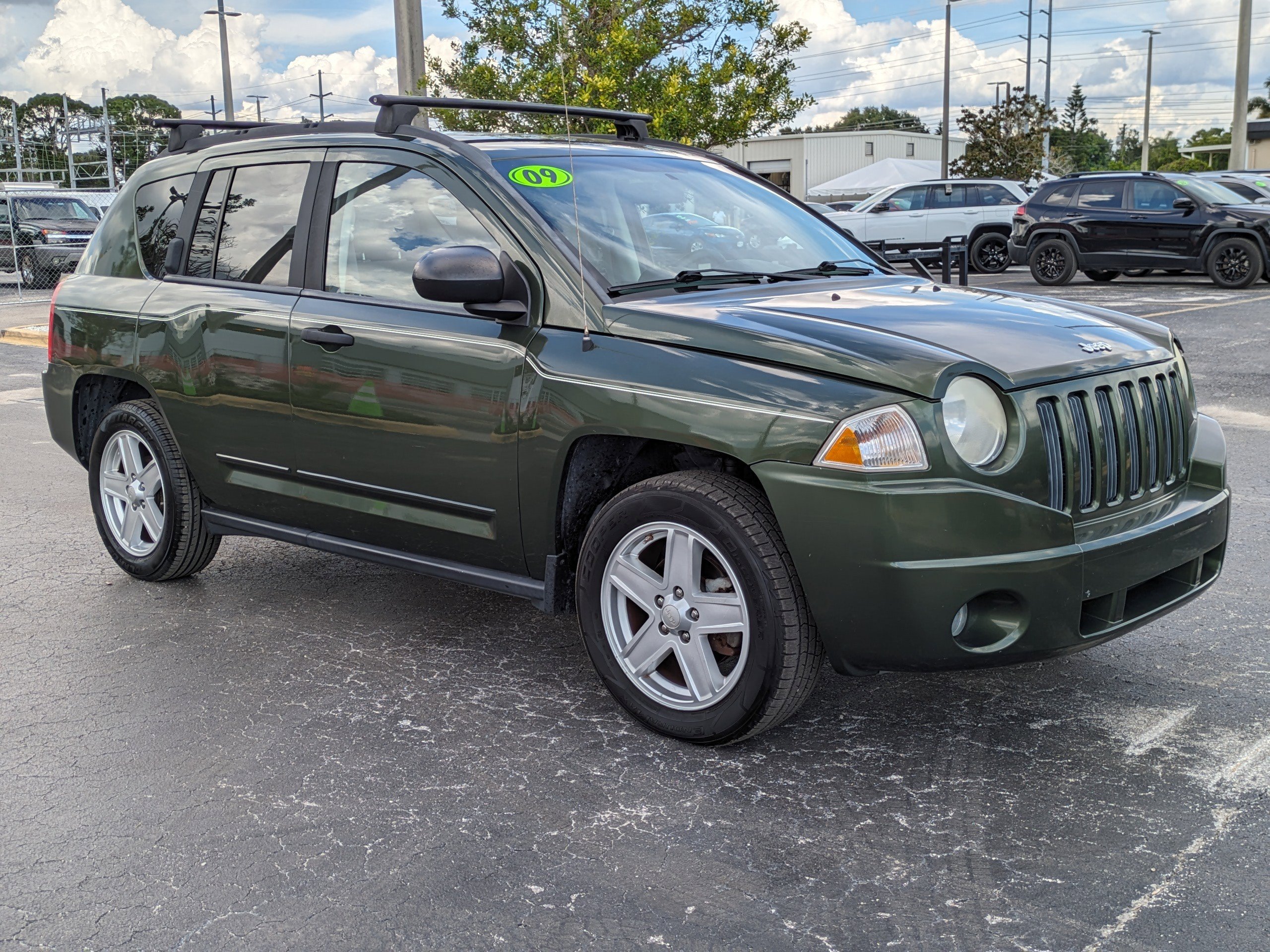 Used 2009 Jeep Compass Sport with VIN 1J4FT47A89D123987 for sale in Seminole, FL