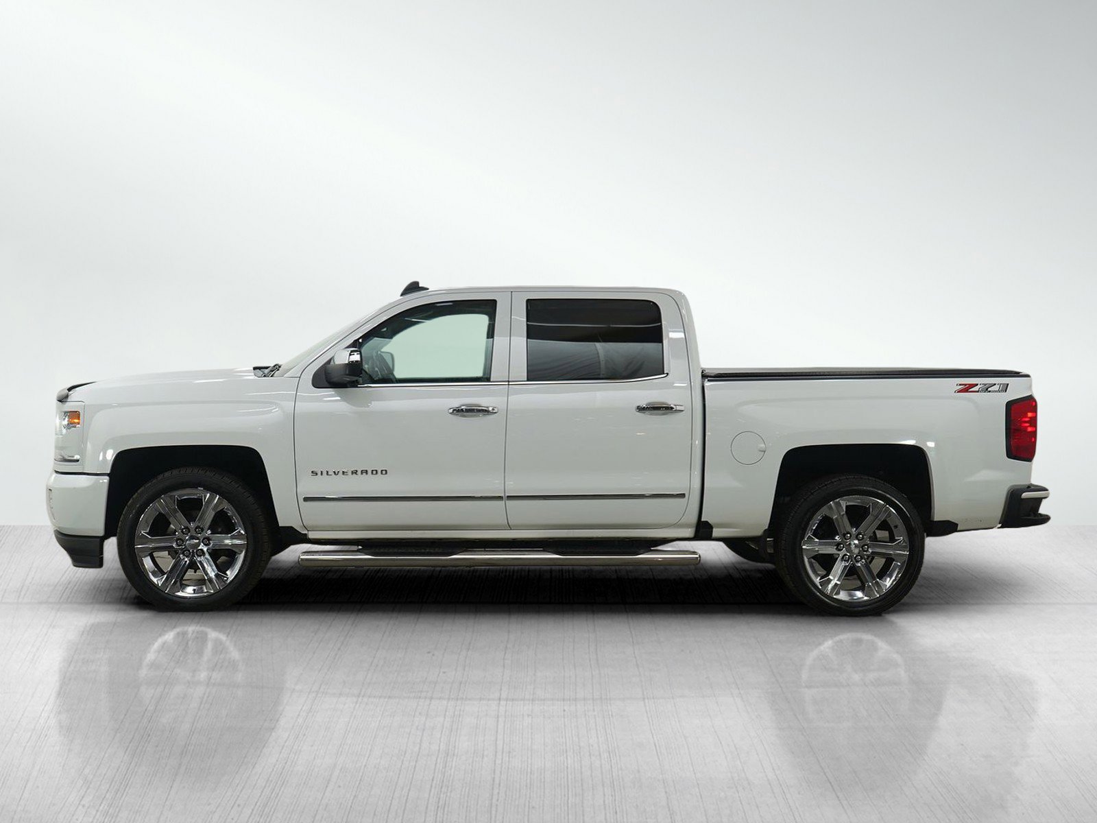 Used 2018 Chevrolet Silverado 1500 LTZ Z71 with VIN 3GCUKSEJ0JG142595 for sale in Hopkins, Minnesota