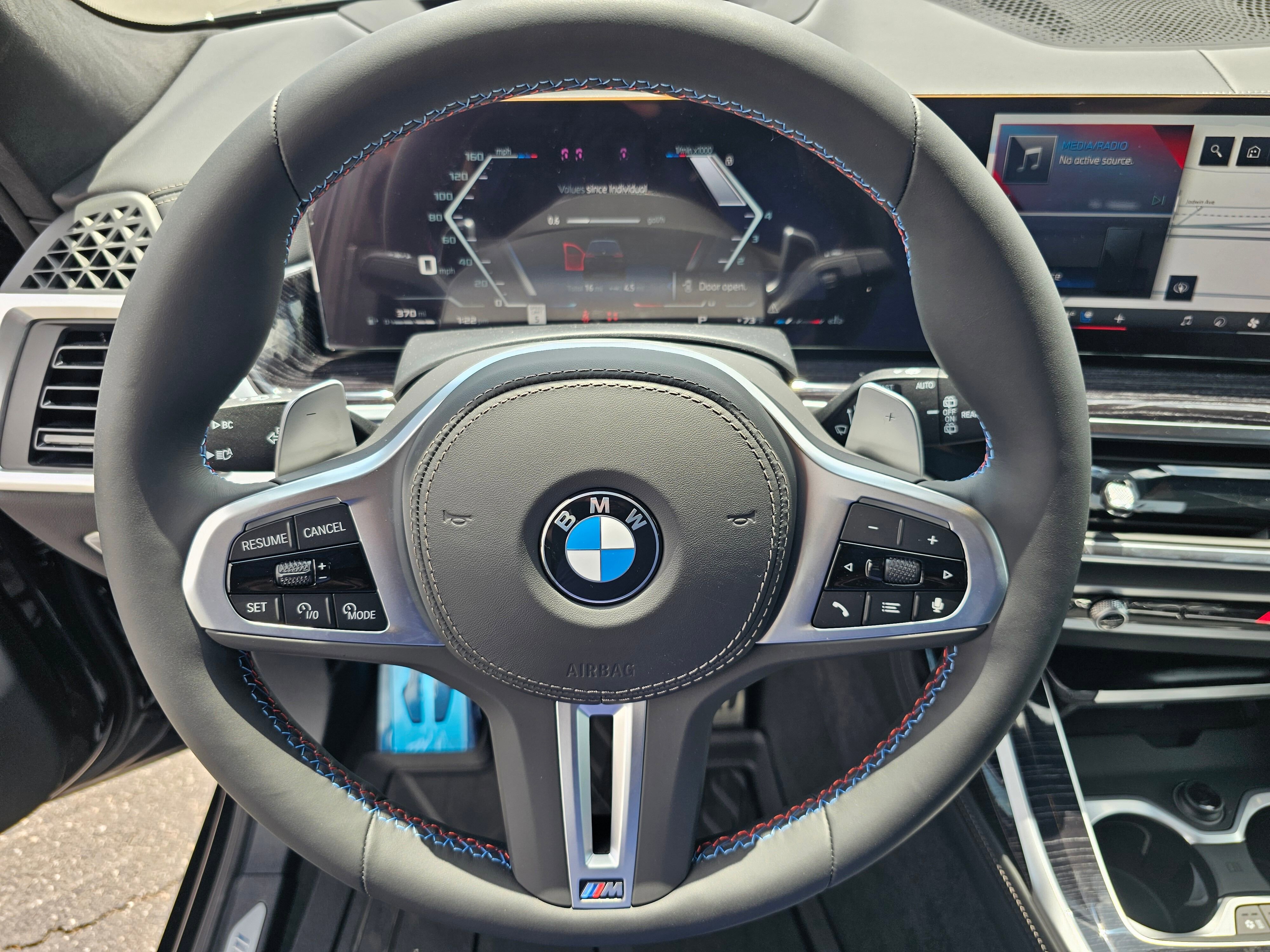 New 2026 Black Sapphire Metallic BMW M60i image 17