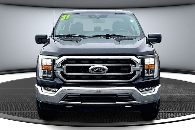 Used 2021 Ford F-150 XLT with VIN 1FTFW1E51MKE82202 for sale in Kansas City