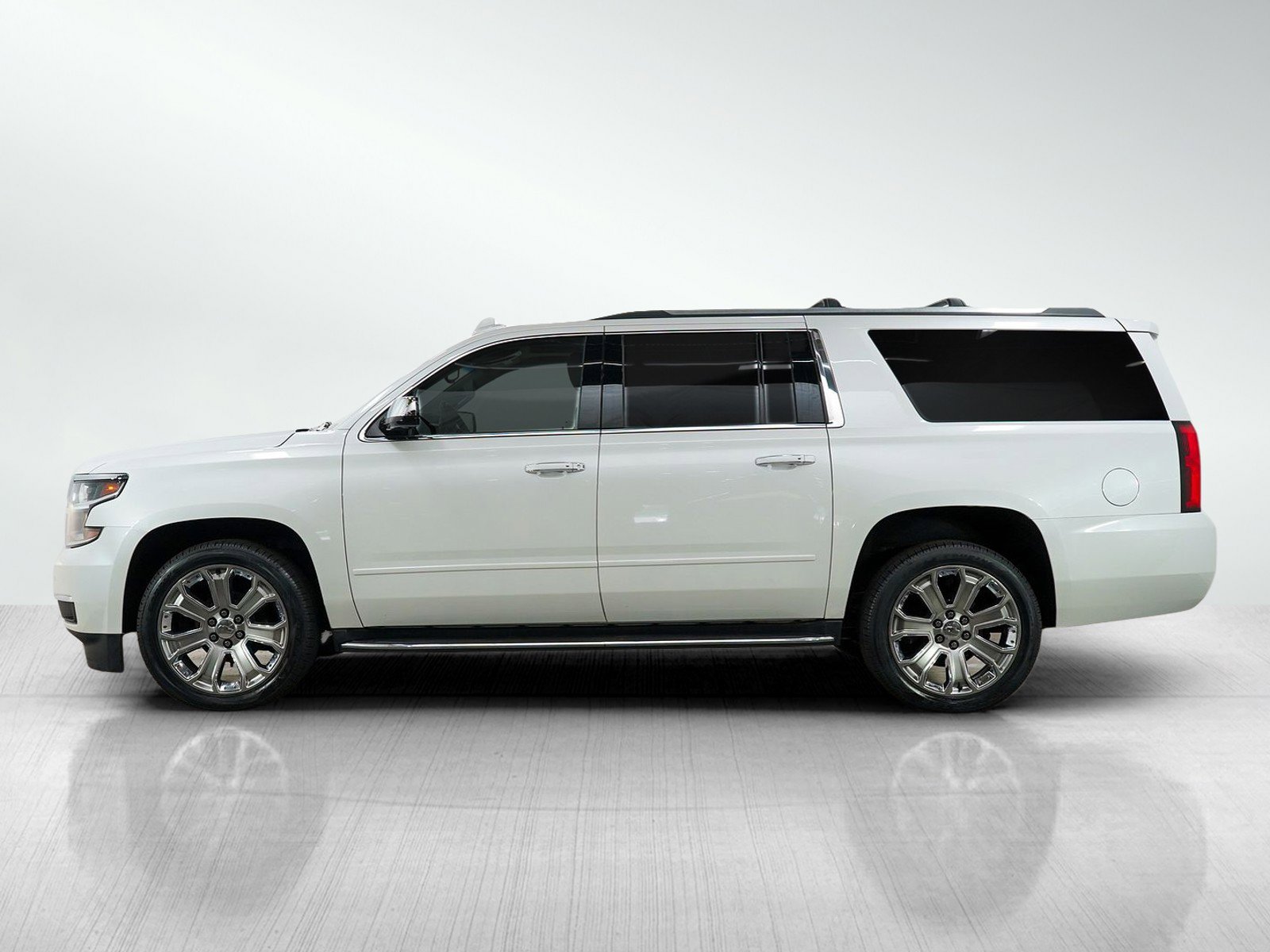Used 2017 Chevrolet Suburban Premier with VIN 1GNSKJKC1HR166963 for sale in Hopkins, Minnesota