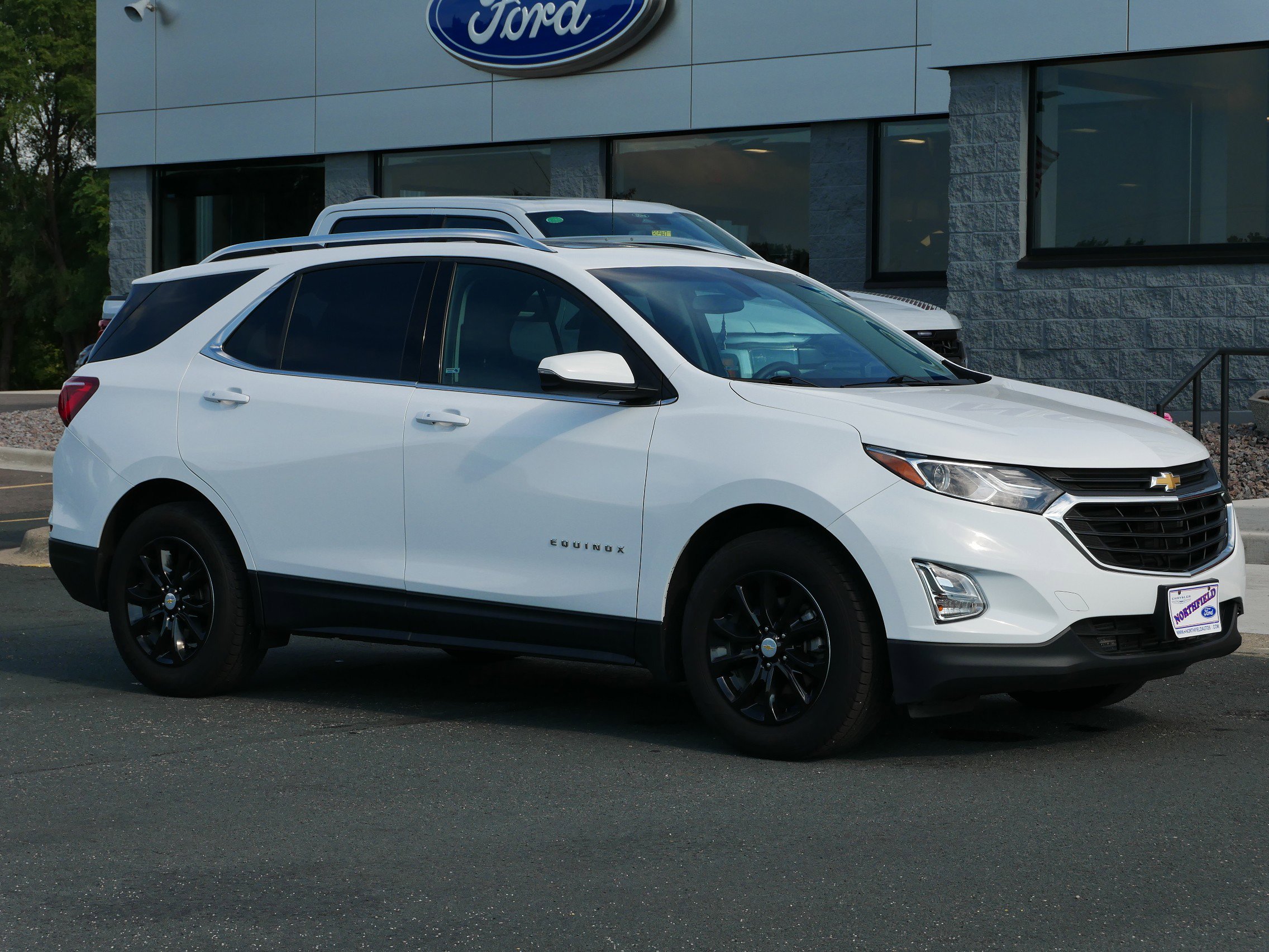 Used 2018 Chevrolet Equinox LT with VIN 2GNAXJEV5J6182384 for sale in Northfield, Minnesota