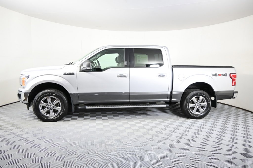 Used 2018 Ford F-150 XLT with VIN 1FTEW1EPXJFD00398 for sale in Forest Lake, Minnesota