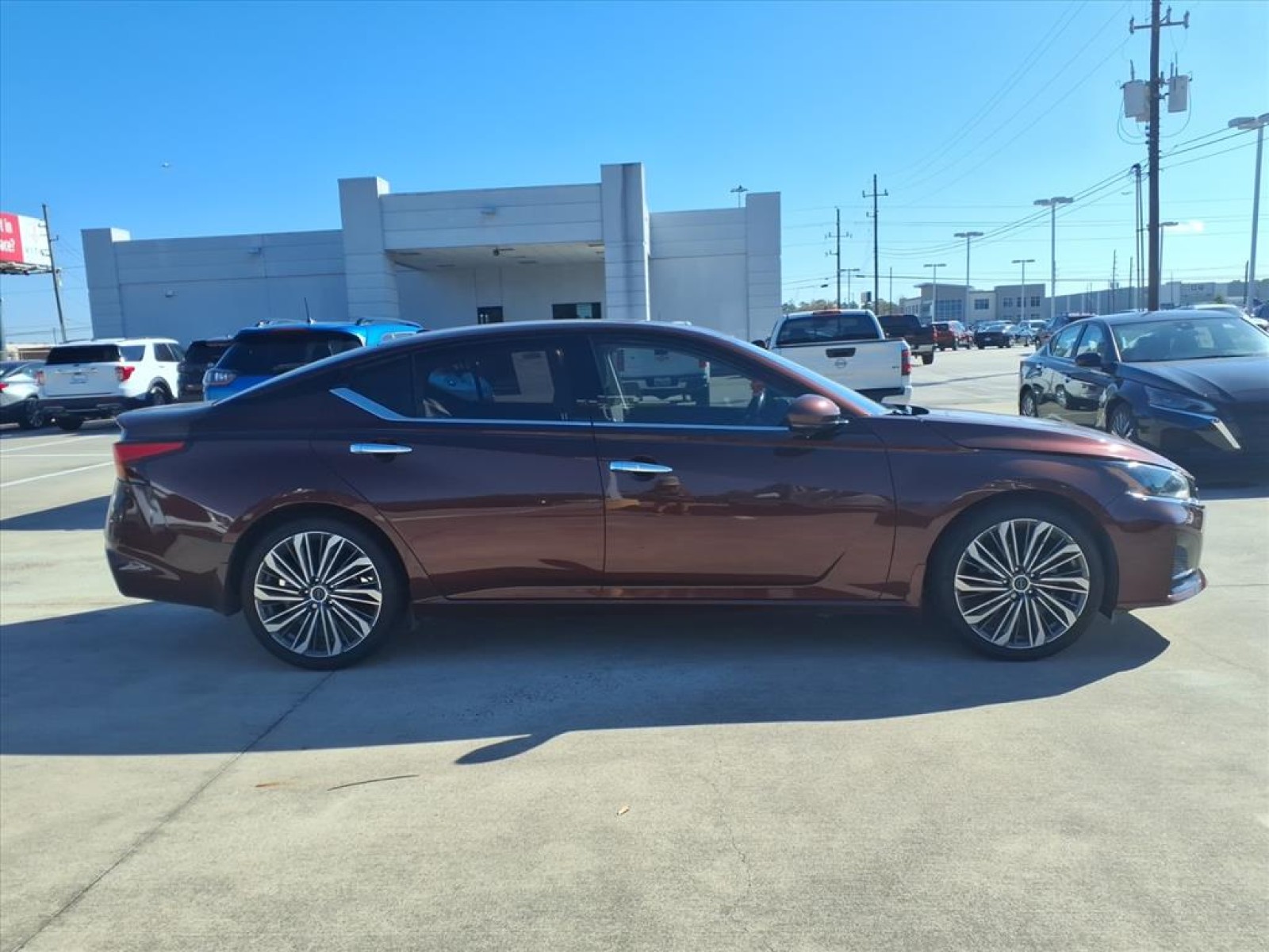 2023 Nissan Altima 2.5 SL Red at Robbins Nissan