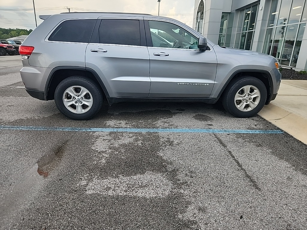 Used 2014 Jeep Grand Cherokee Laredo with VIN 1C4RJEAG9EC276597 for sale in Arab, AL