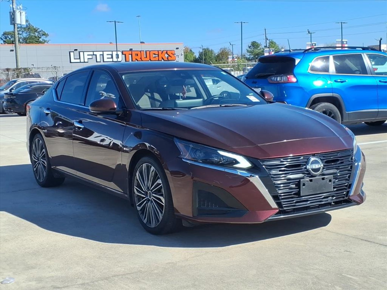 2023 Nissan Altima 2.5 SL Red at Robbins Nissan