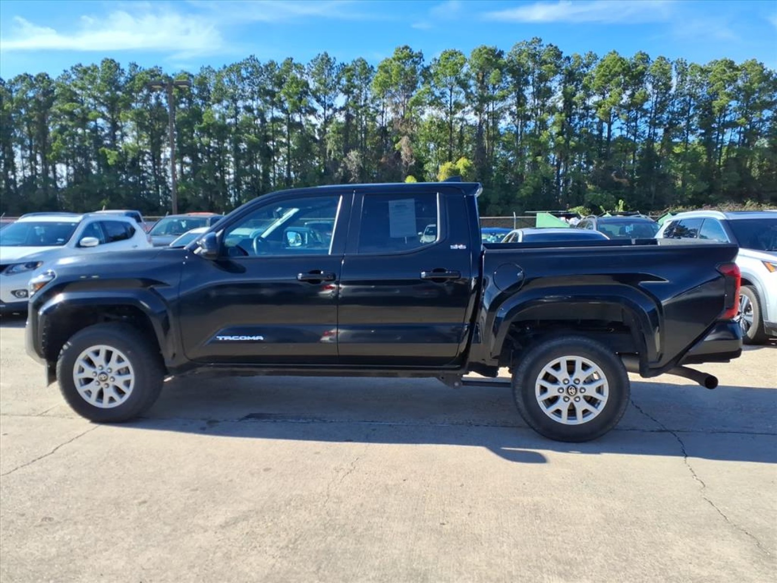 2024 Toyota Tacoma 4WD SR5 Black at Robbins Nissan