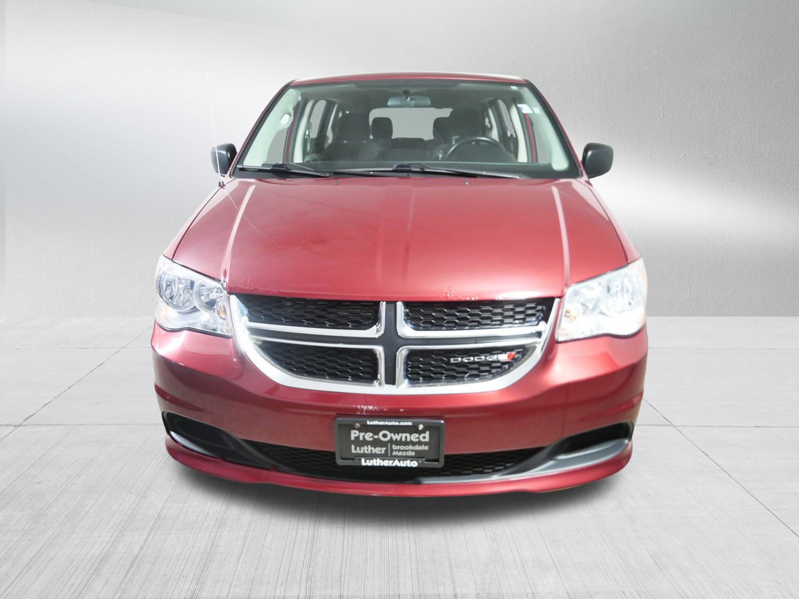 Used 2014 Dodge Grand Caravan SE with VIN 2C4RDGBG5ER166574 for sale in Brooklyn Center, Minnesota