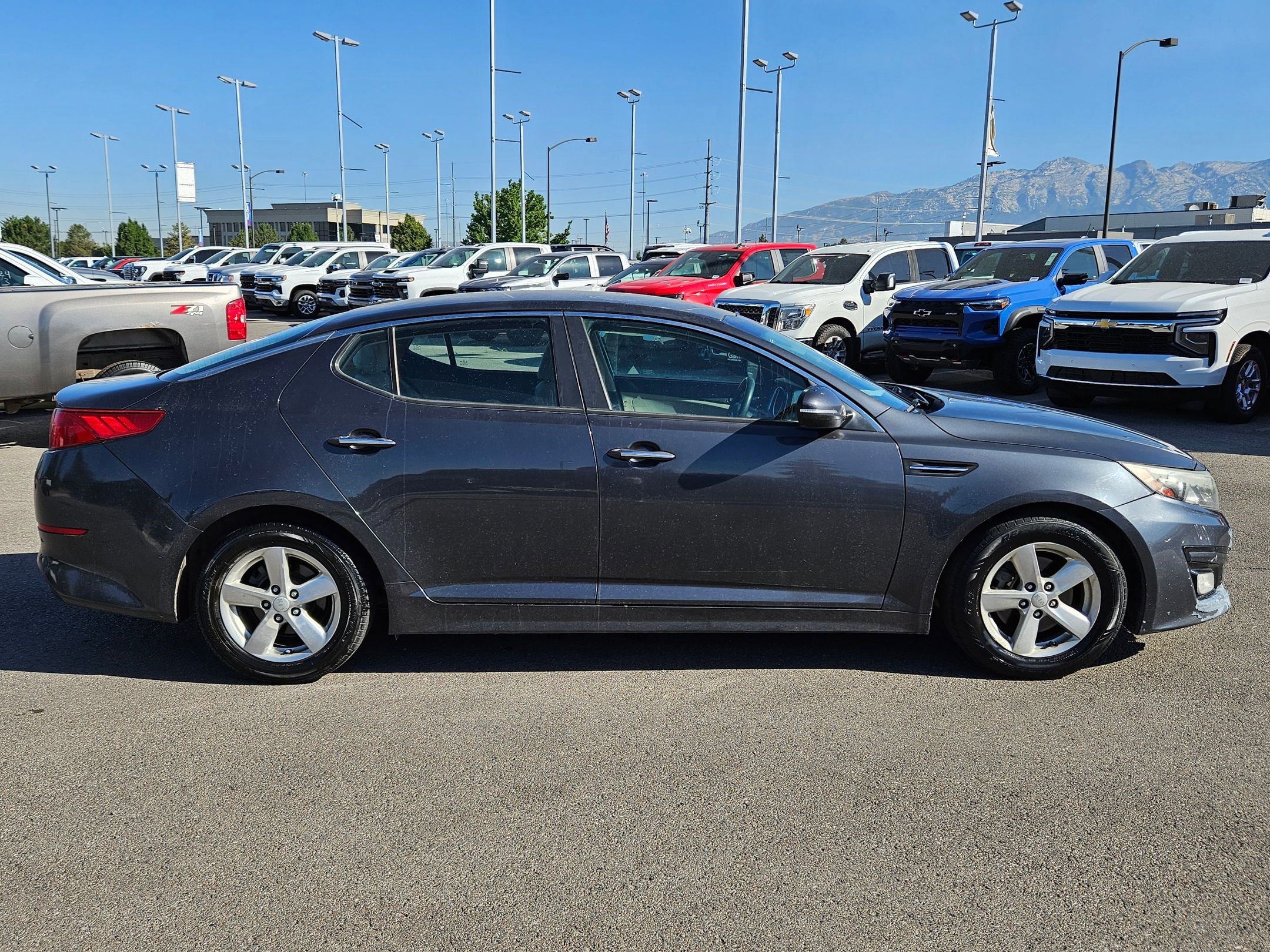Used 2015 Kia Optima LX with VIN KNAGM4A75F5649212 for sale in American Fork, UT