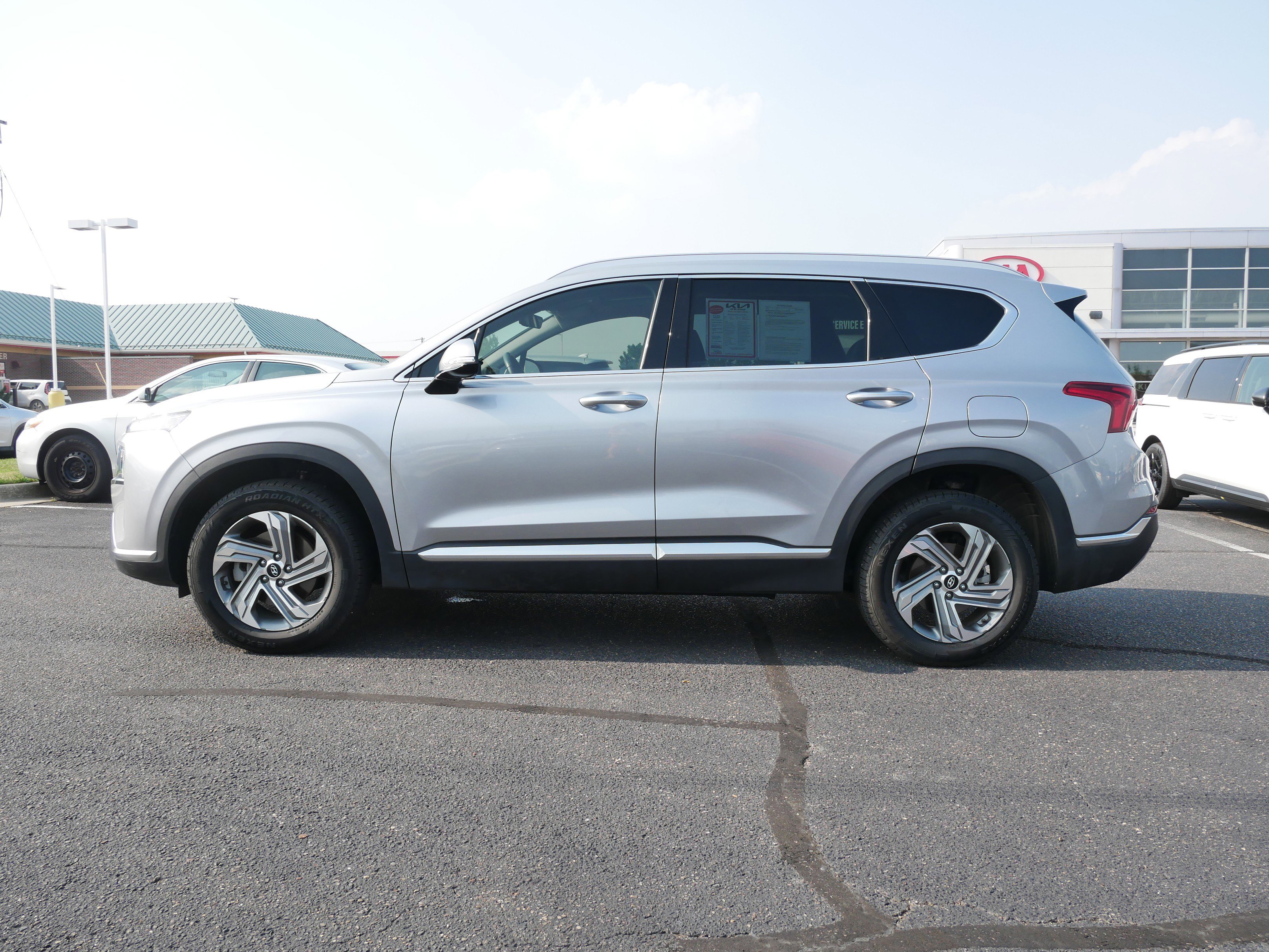 Used 2021 Hyundai Santa Fe SEL with VIN 5NMS3DAJ6MH310965 for sale in Waite Park, Minnesota