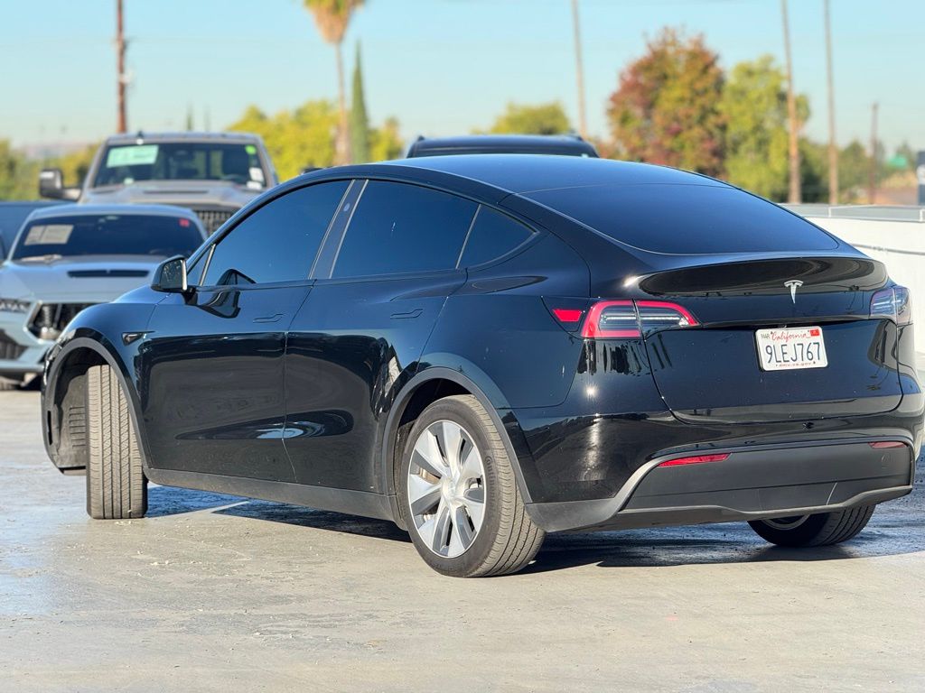 Used 2024 Tesla Model Y Long Range with VIN 7SAYGDED5RF018092 for sale in Kansas City