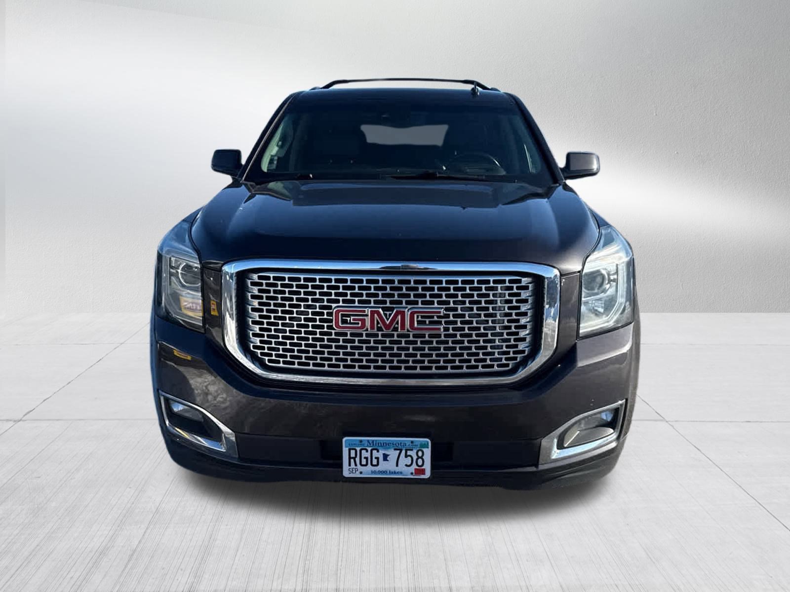 Used 2015 GMC Yukon XL Denali with VIN 1GKS2JKJ4FR264037 for sale in Brooklyn Center, Minnesota
