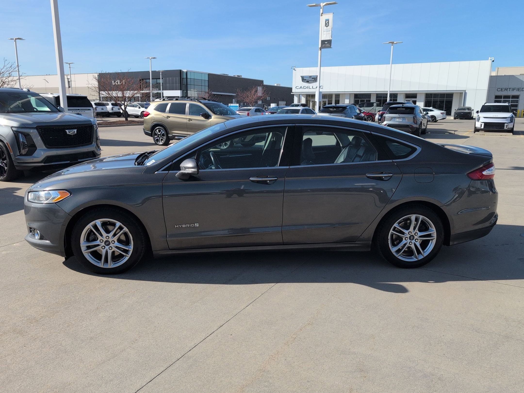 Used 2016 Ford Fusion Hybrid Titanium with VIN 3FA6P0RU0GR194833 for sale in Salt Lake City, UT