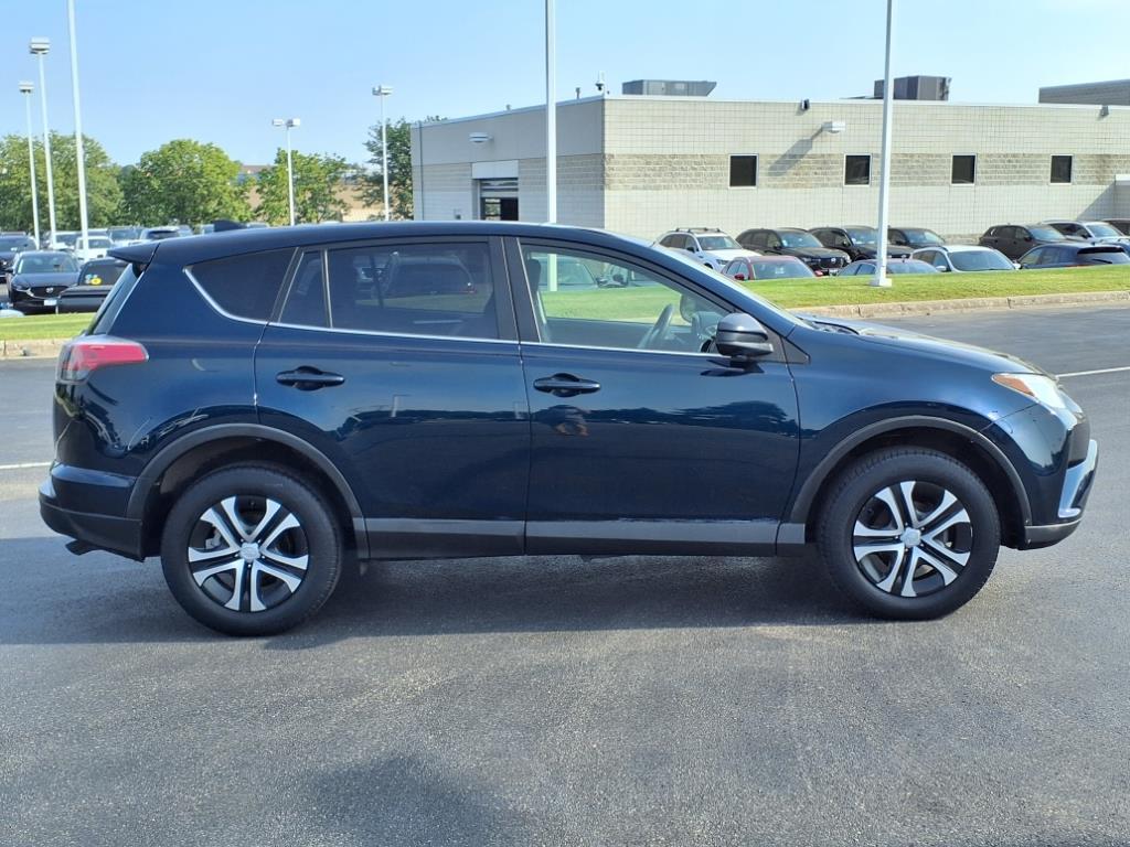 Certified 2018 Toyota RAV4 LE with VIN JTMBFREV8JJ179299 for sale in Burnsville, Minnesota