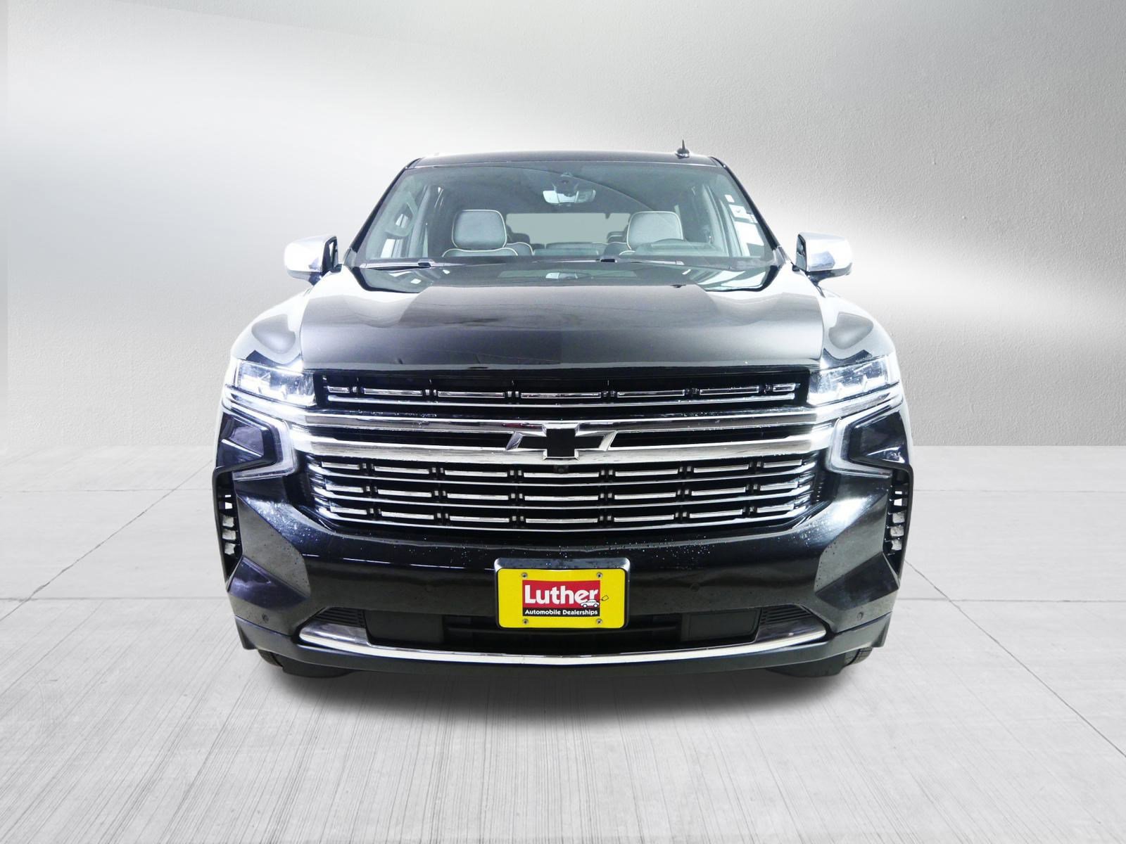 Certified 2021 Chevrolet Tahoe Premier with VIN 1GNSKSKDXMR138460 for sale in Brooklyn Center, Minnesota