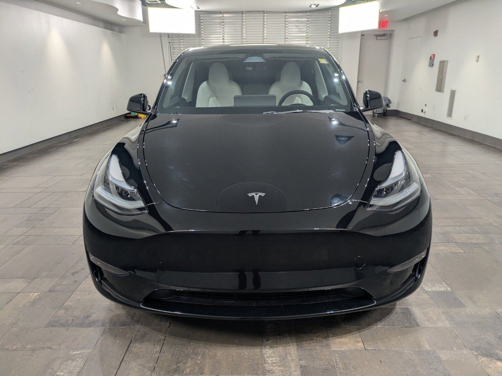 Used 2024 Tesla Model Y Long Range with VIN 7SAYGDEE4RA223604 for sale in West Palm Beach, FL