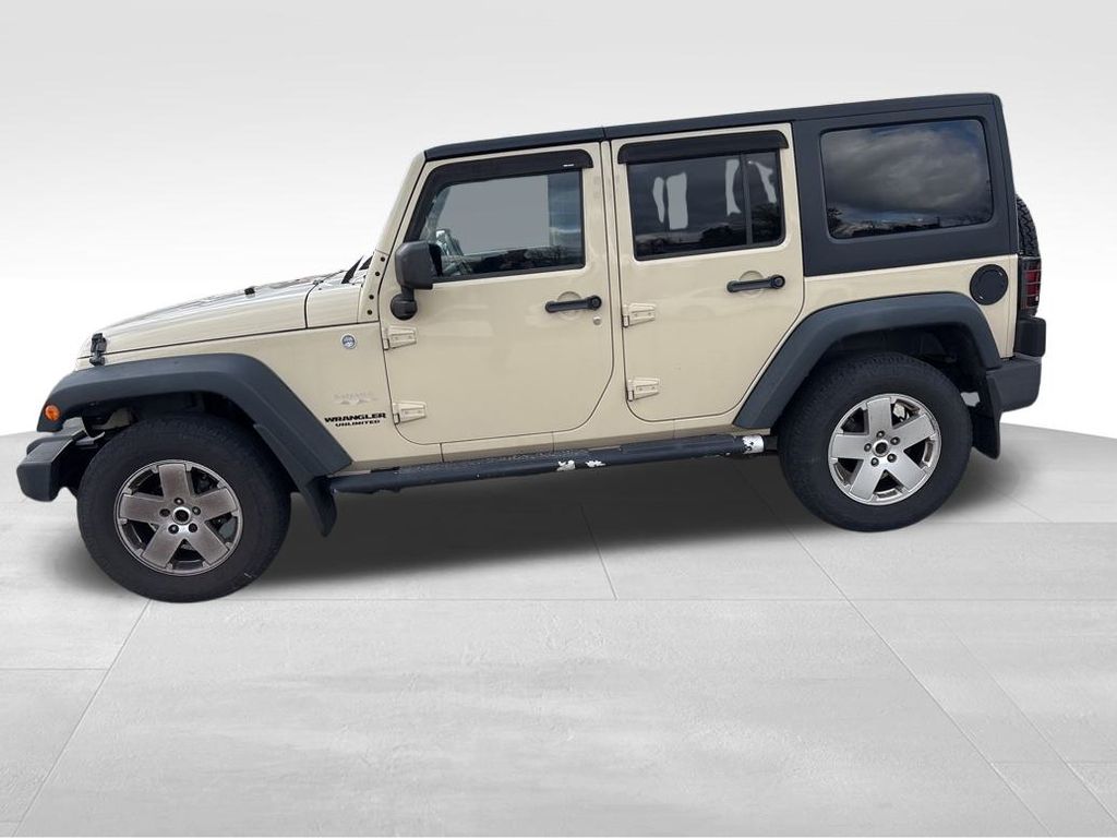 Used 2011 Jeep Wrangler Unlimited Sahara with VIN 1J4HA5H1XBL568665 for sale in North Huntingdon, PA