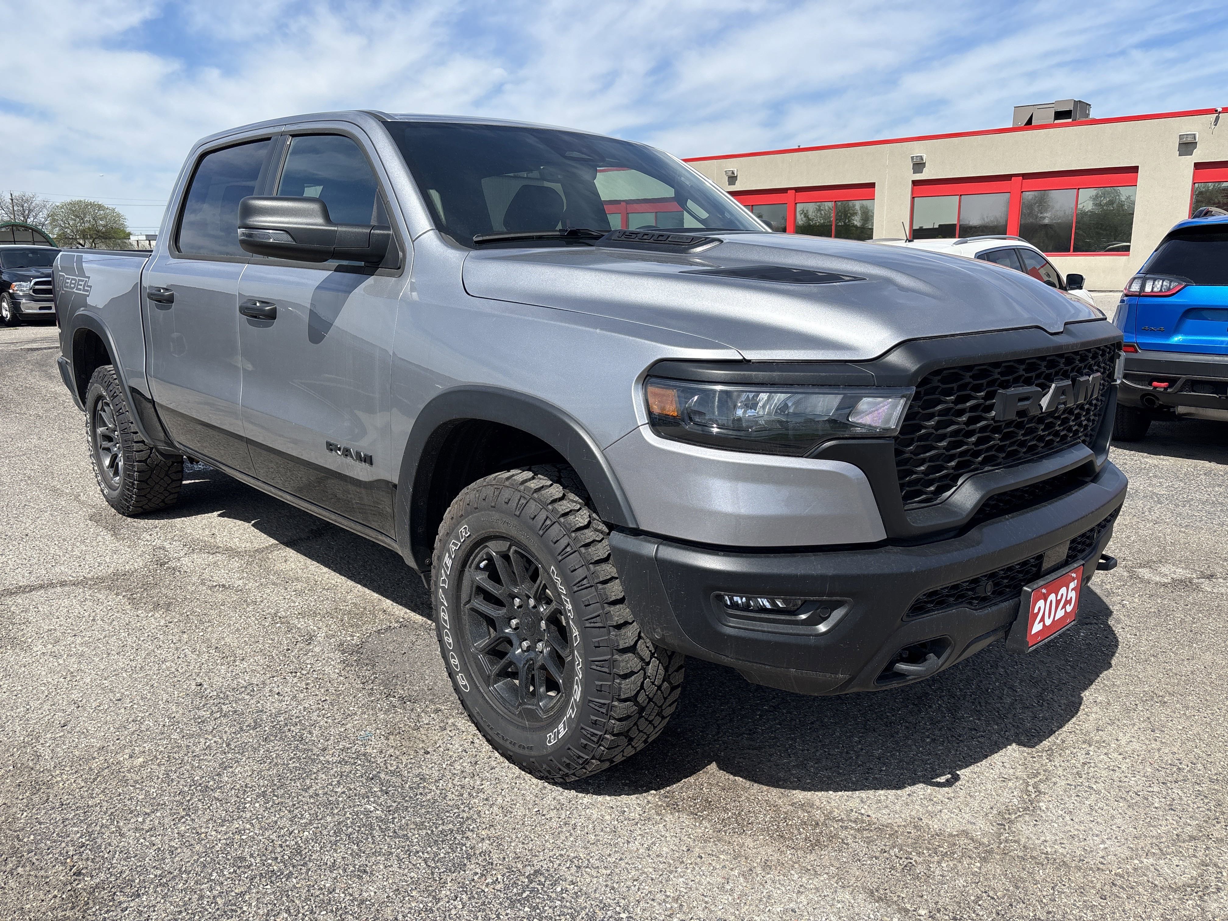 Used 2025 Billet Silver Metallic Ram Rebel image 1