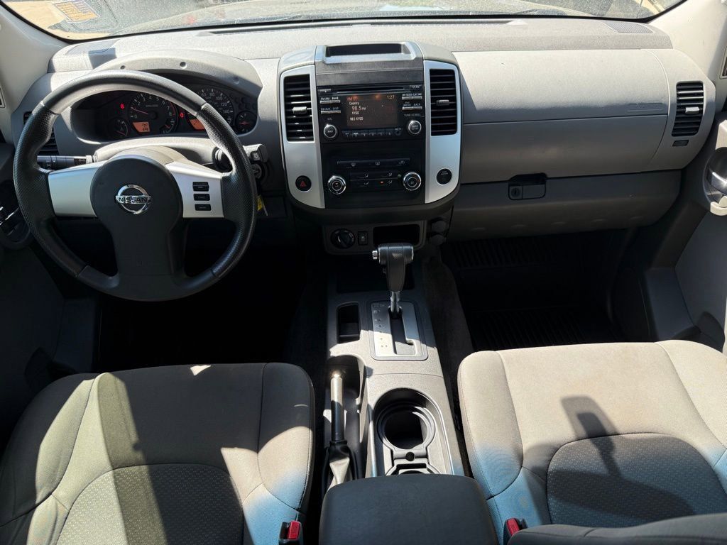 Used 2013 Super Black Nissan S image 1