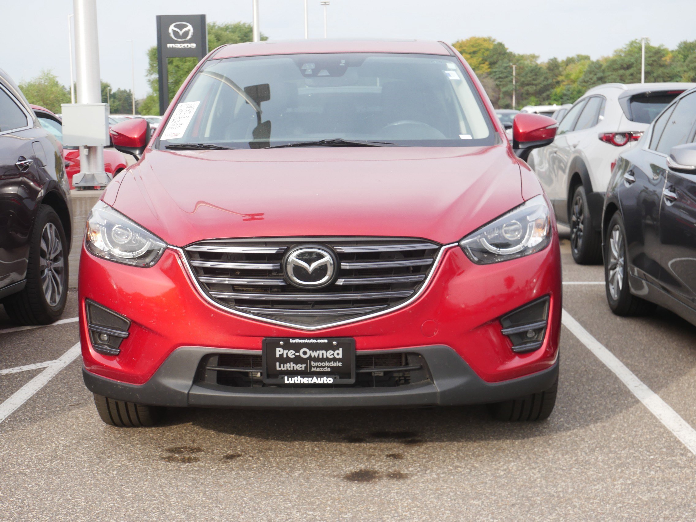 Used 2016 Mazda CX-5 Grand Touring with VIN JM3KE4DY5G0799244 for sale in Brooklyn Center, Minnesota