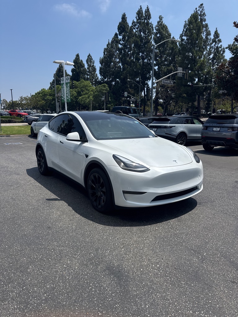 Used 2024 Tesla Model Y Long Range with VIN 7SAYGDEEXRA258048 for sale in Kansas City