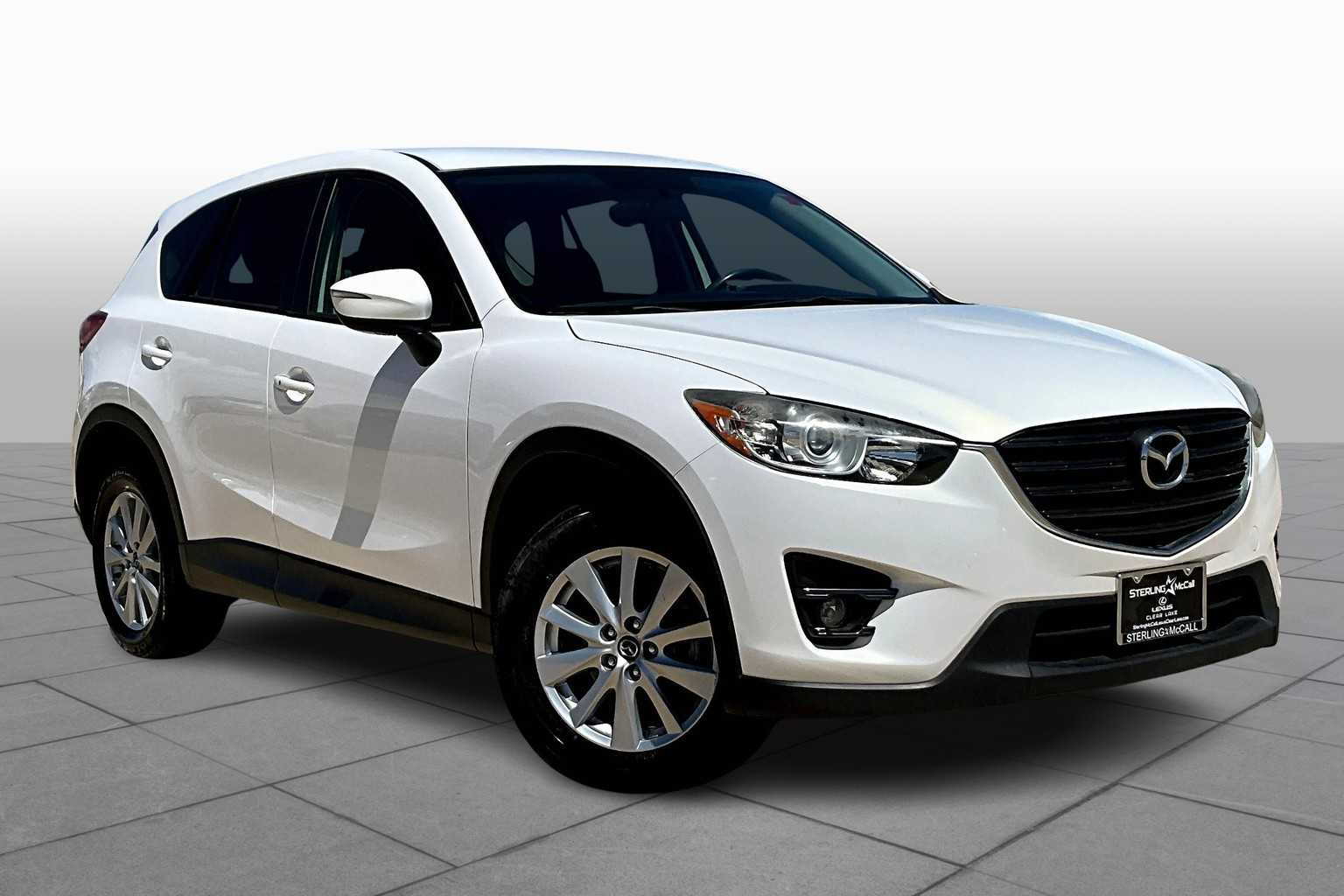Used 2016 Mazda CX-5 Touring with VIN JM3KE2CY2G0786294 for sale in Friendswood, TX
