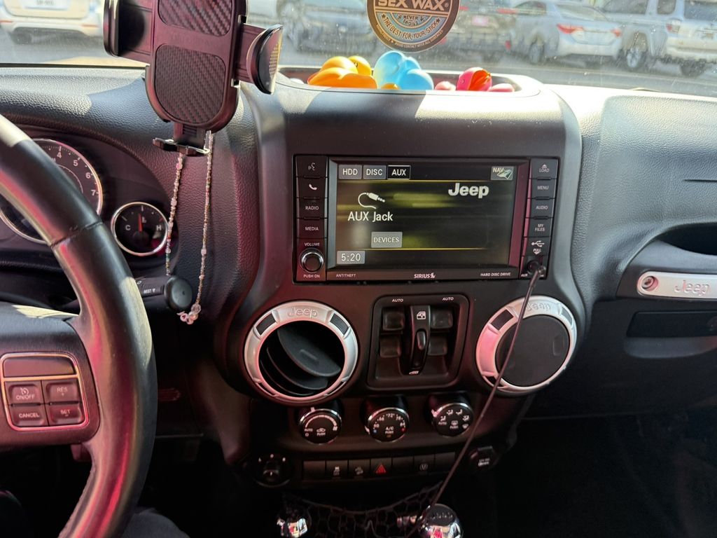 Used 2013 Blue Jeep Unlimited Sahara image 10