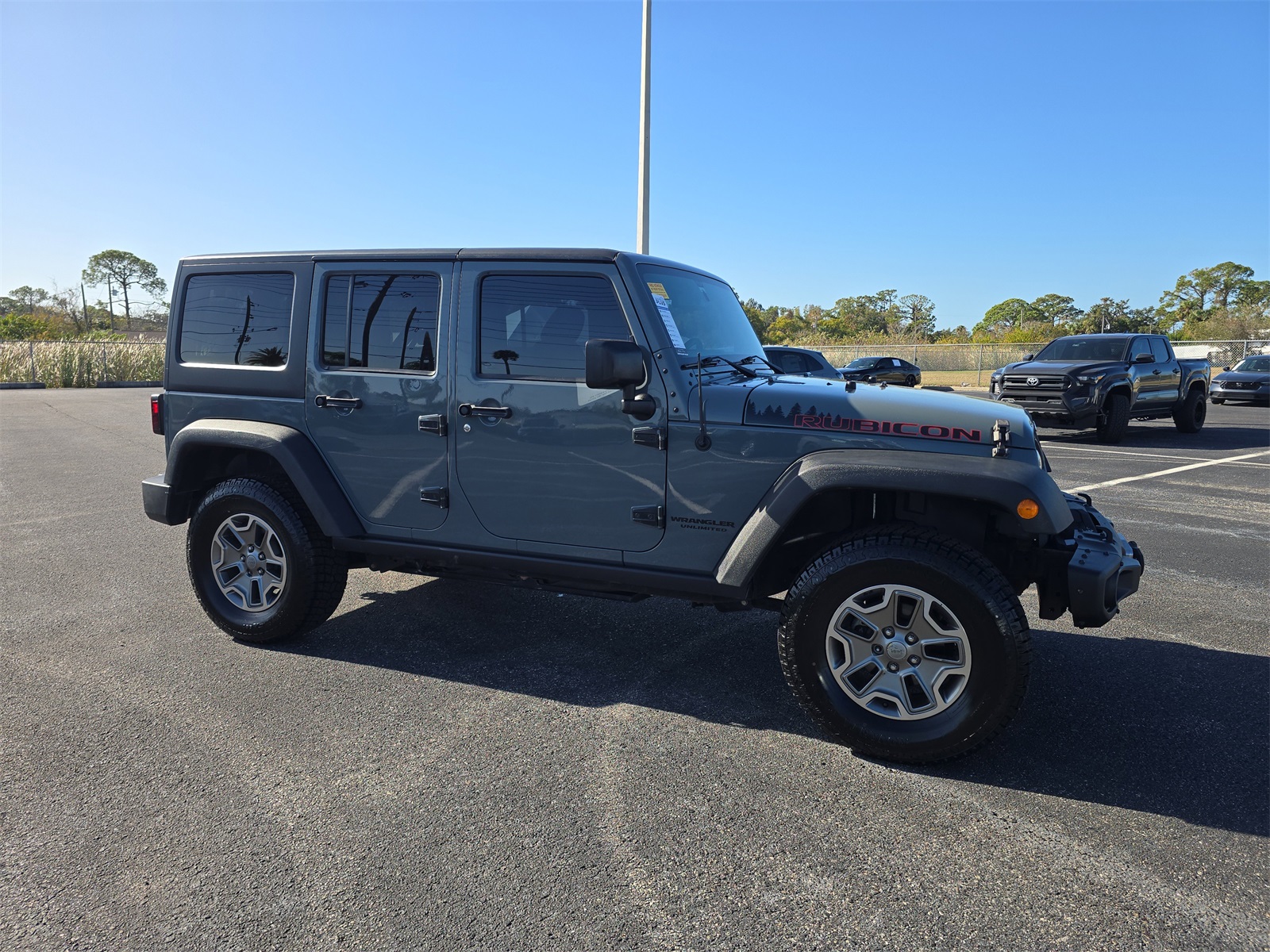 Used 2014 Jeep Wrangler Unlimited Rubicon with VIN 1C4BJWFG1EL219634 for sale in Port Richey, FL