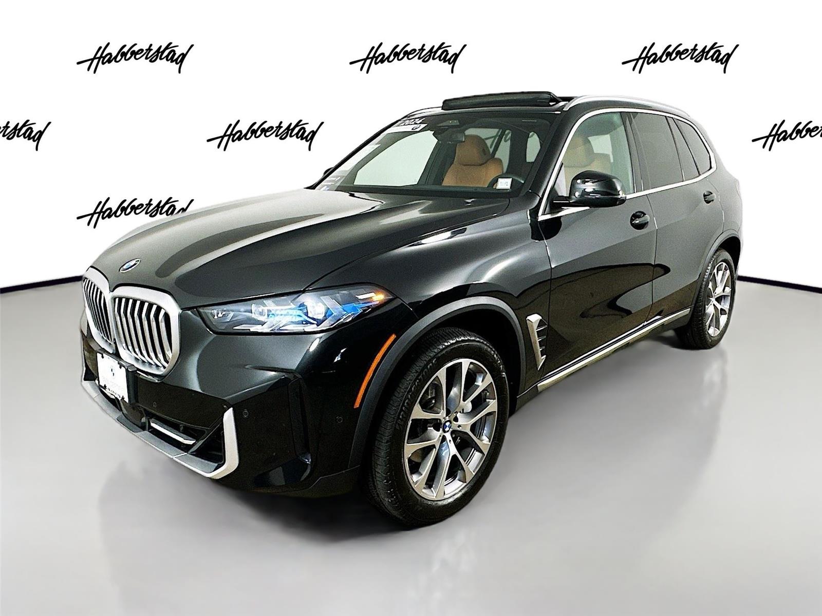 Certified Used 2025 Black Sapphire Metallic BMW xDrive40i image 1