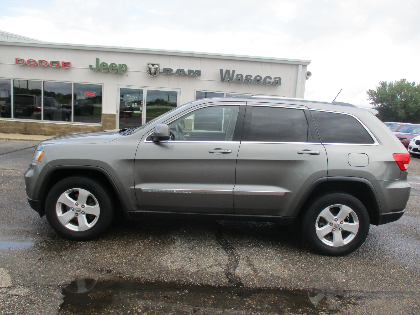 Used 2012 Jeep Grand Cherokee Laredo with VIN 1C4RJFAG9CC149934 for sale in Waseca, Minnesota