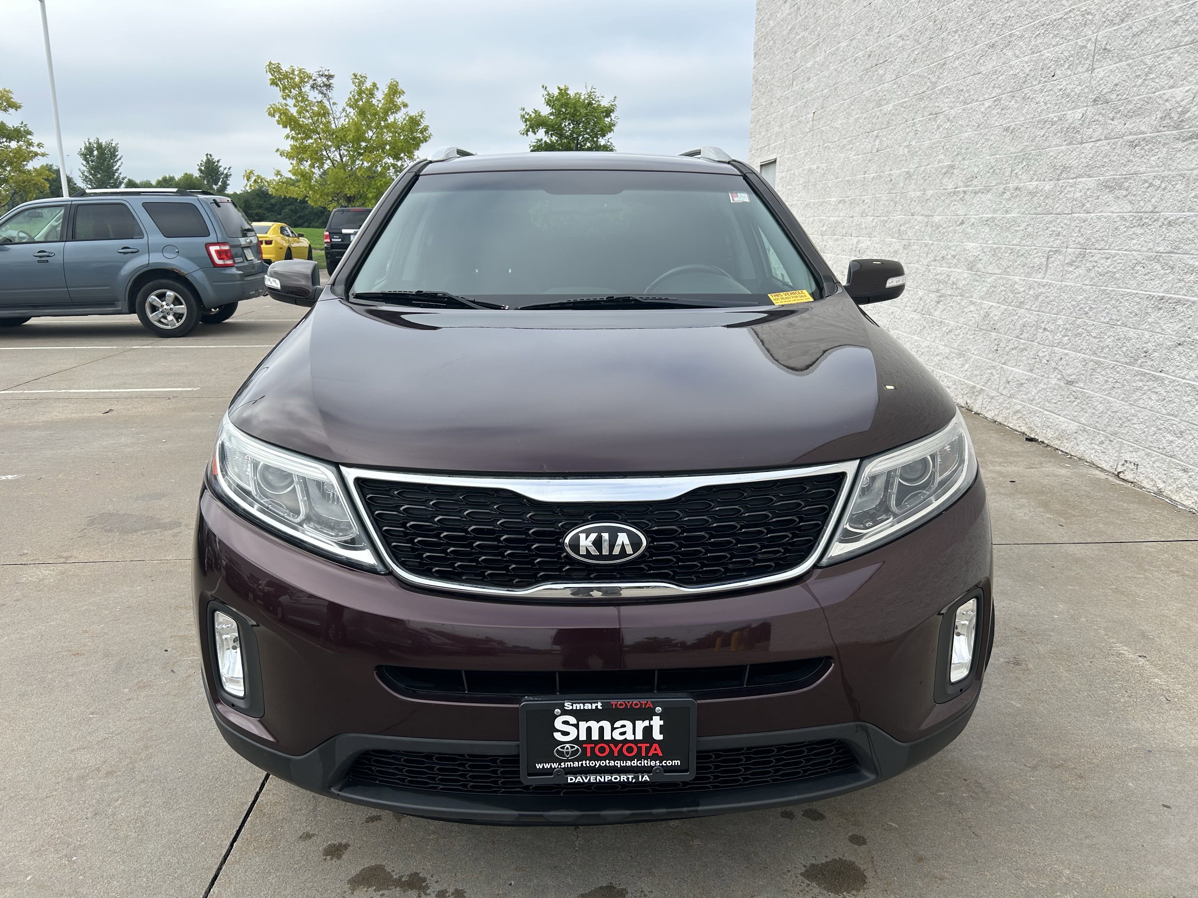 Used 2015 Kia Sorento LX with VIN 5XYKT4A6XFG580614 for sale in Davenport, IA