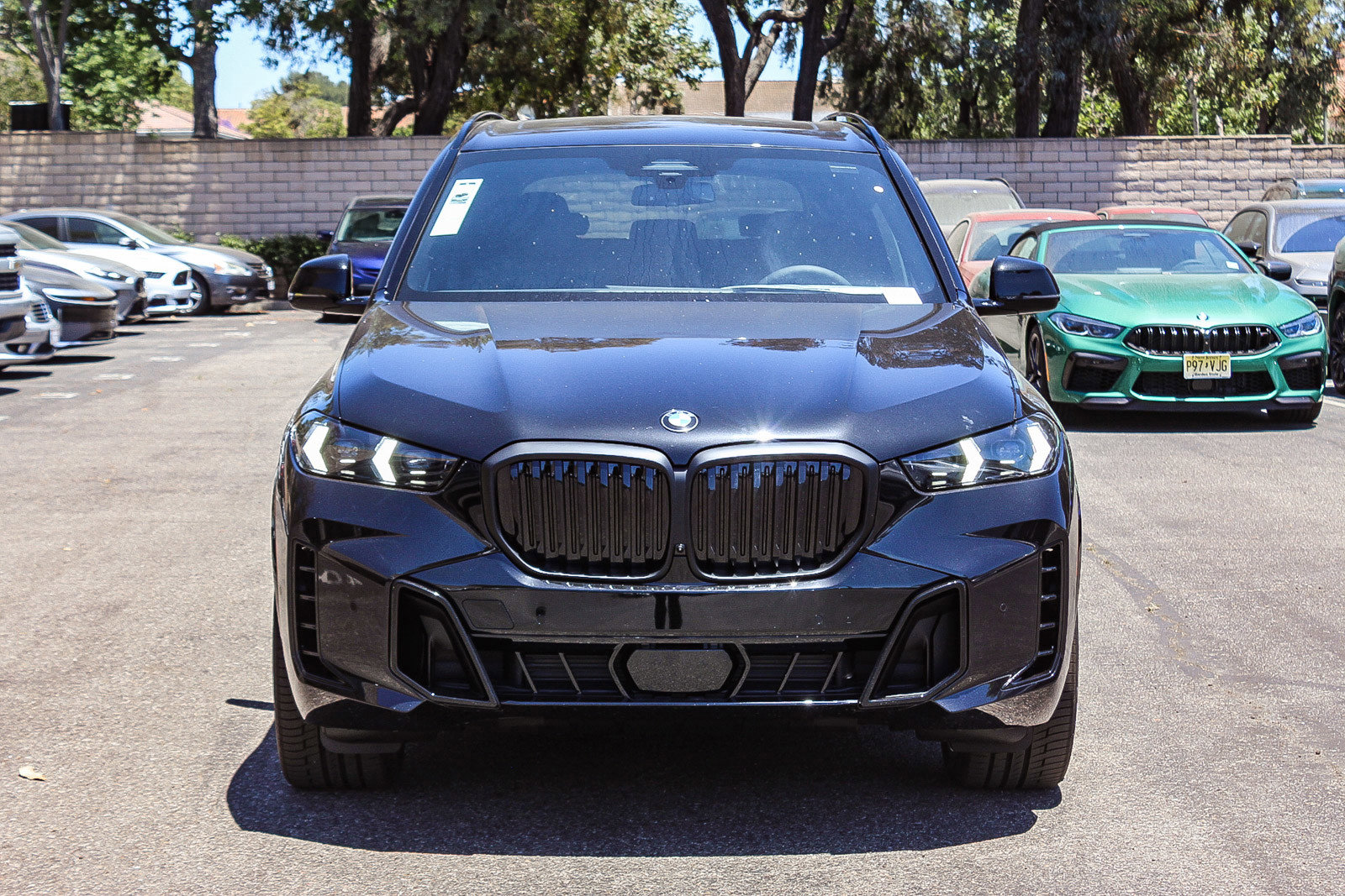 New 2026 Black Sapphire Metallic BMW sDrive40i image 2
