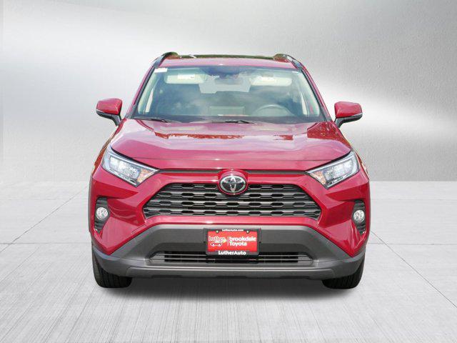Certified 2021 Toyota RAV4 XLE Premium with VIN JTMA1RFV1MD078018 for sale in Brooklyn Center, Minnesota