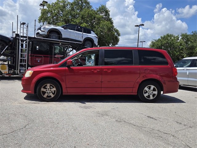 Used 2013 Dodge Grand Caravan SXT with VIN 2C4RDGCG2DR625704 for sale in Orlando, FL