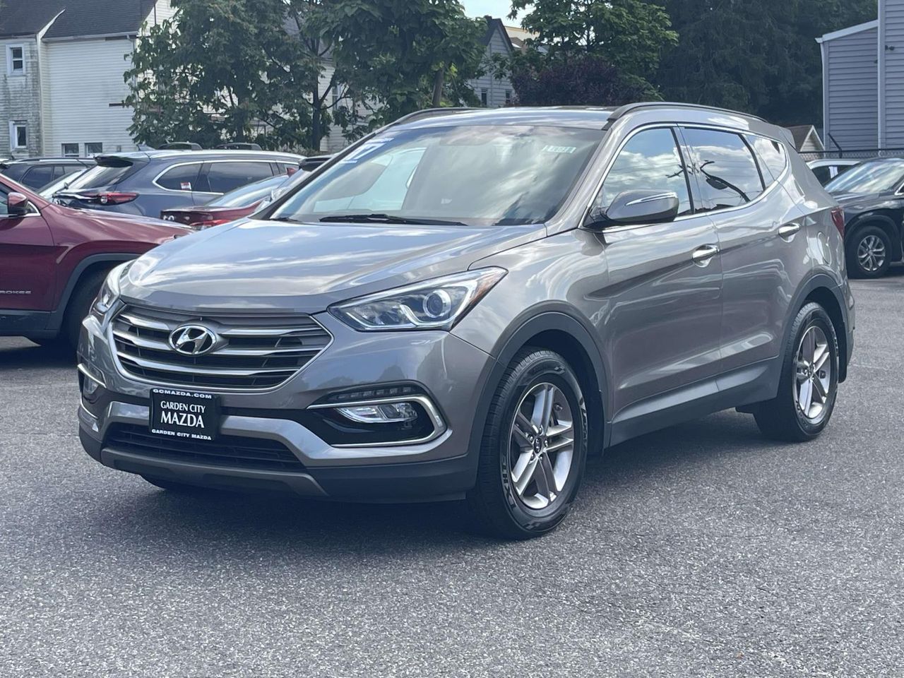 Used 2017 Hyundai Santa Fe Sport with VIN 5NMZUDLB2HH004952 for sale in Glen Cove, NY
