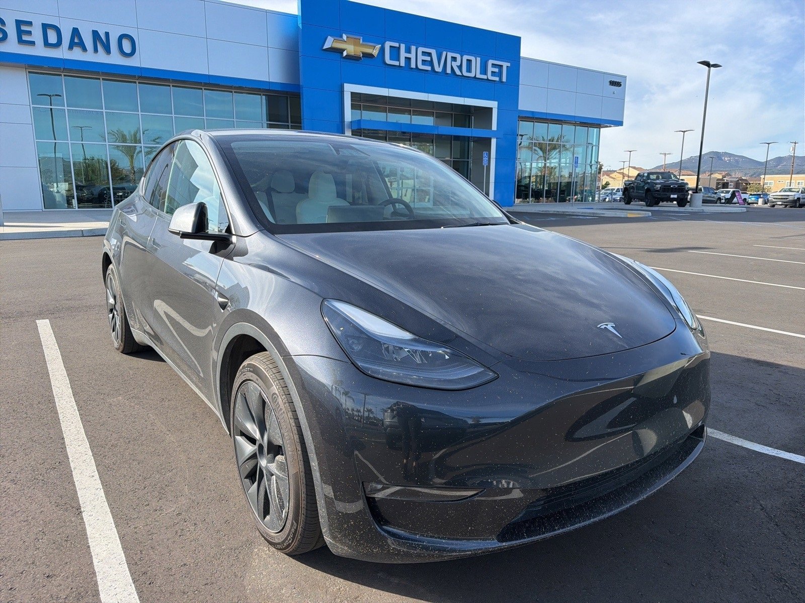 Used 2025 Tesla Model Y Long Range with VIN 7SAYGAEE5SF219486 for sale in Kansas City