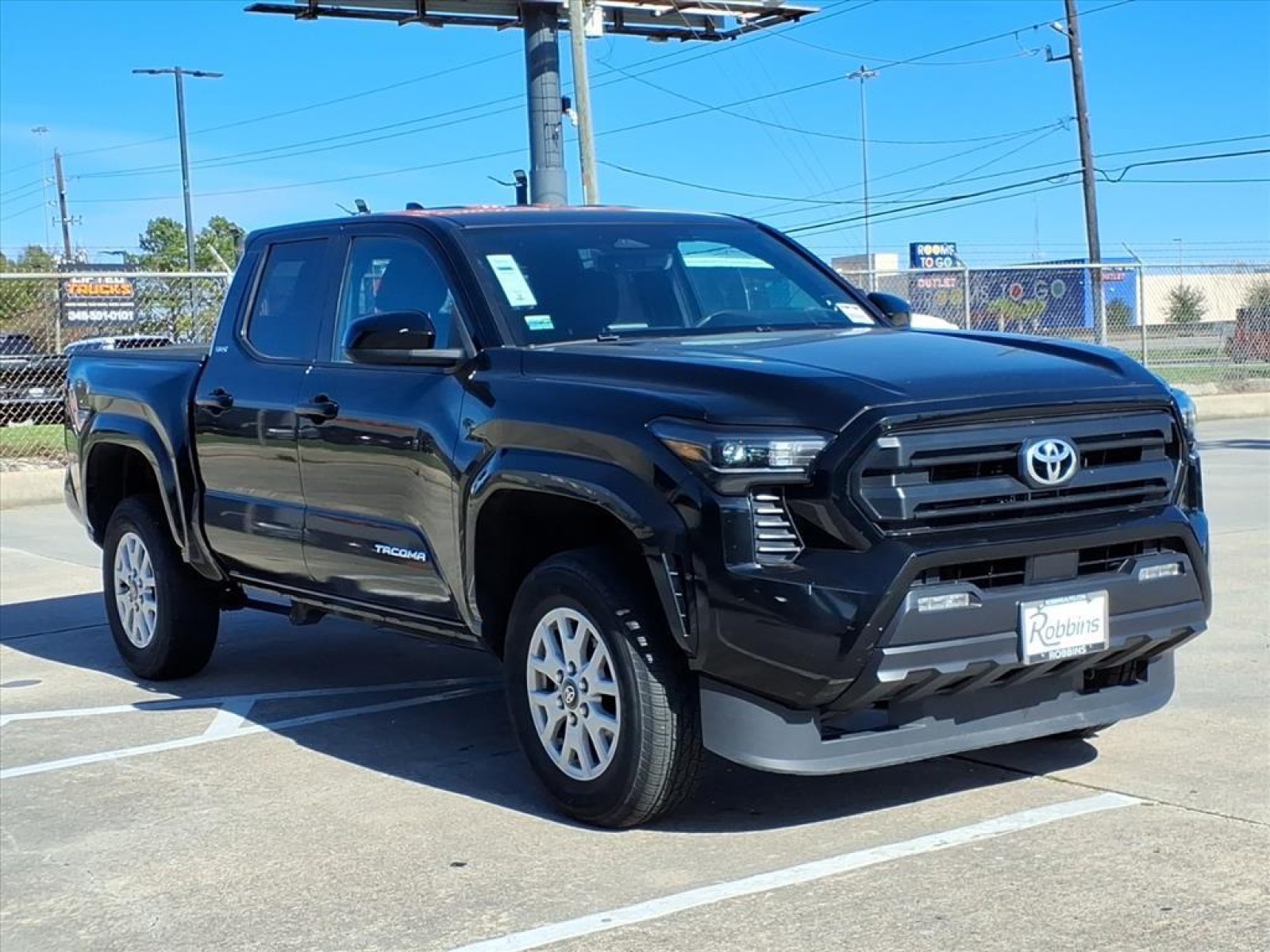 2024 Toyota Tacoma 4WD TRD Off Road Black at Robbins Nissan