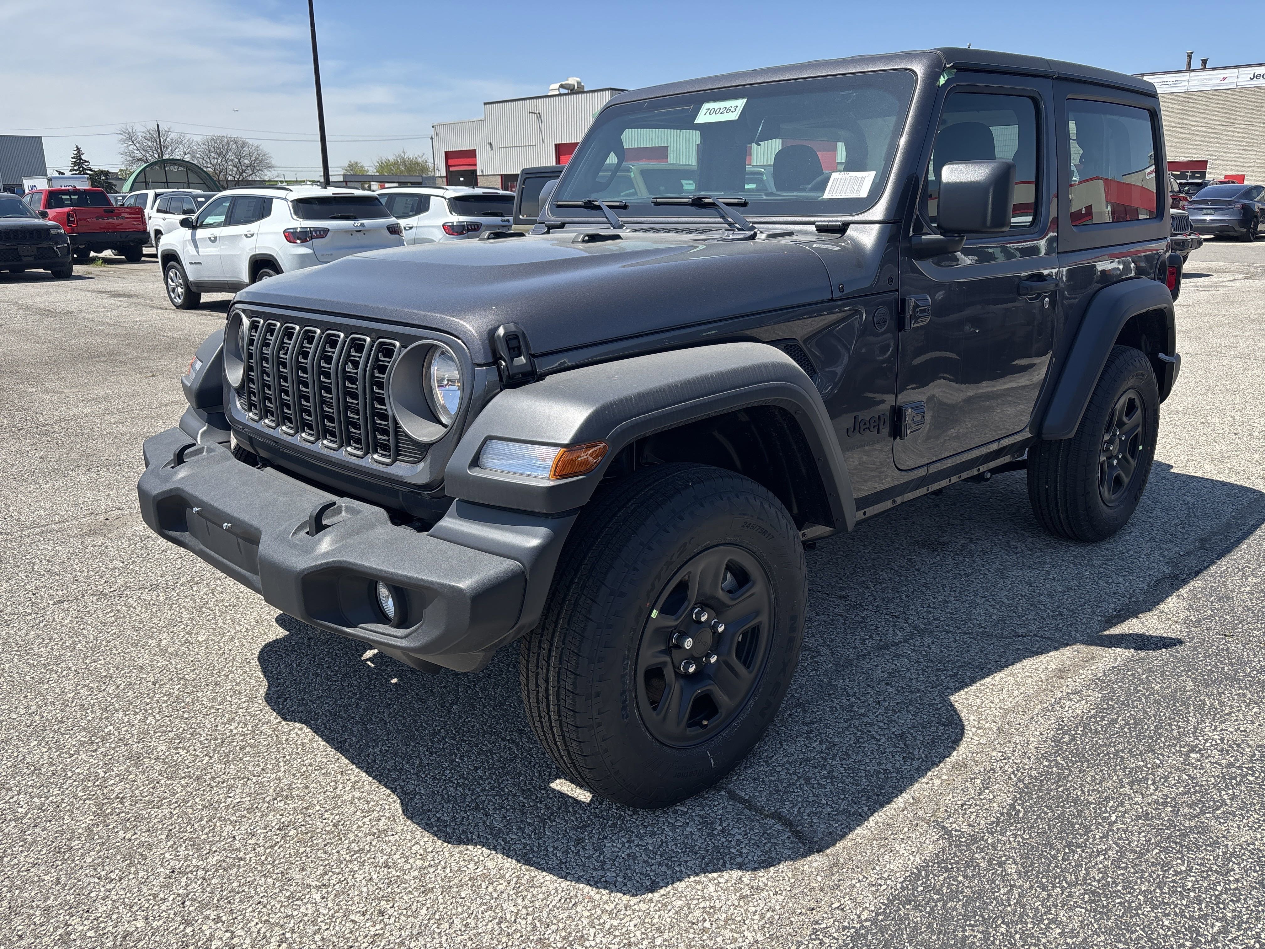 New 2025 Granite Crystal Metallic Jeep Sport image 1
