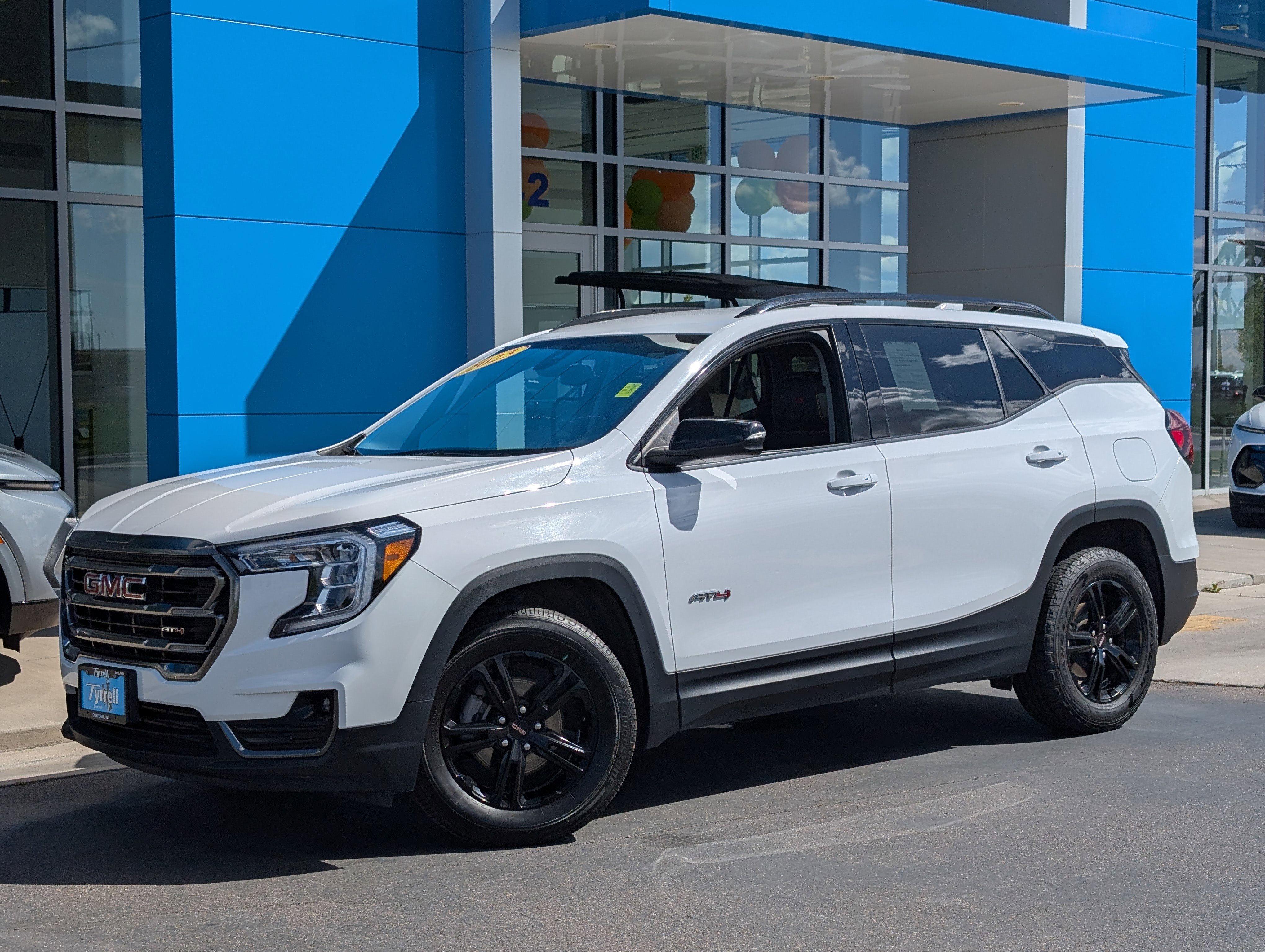 Used 2023 Summit White GMC AT4 image 1