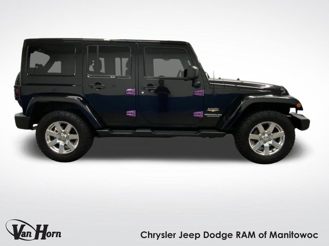 Used 2015 Jeep Wrangler Unlimited Sahara with VIN 1C4BJWEG1FL580820 for sale in Manitowoc, WI