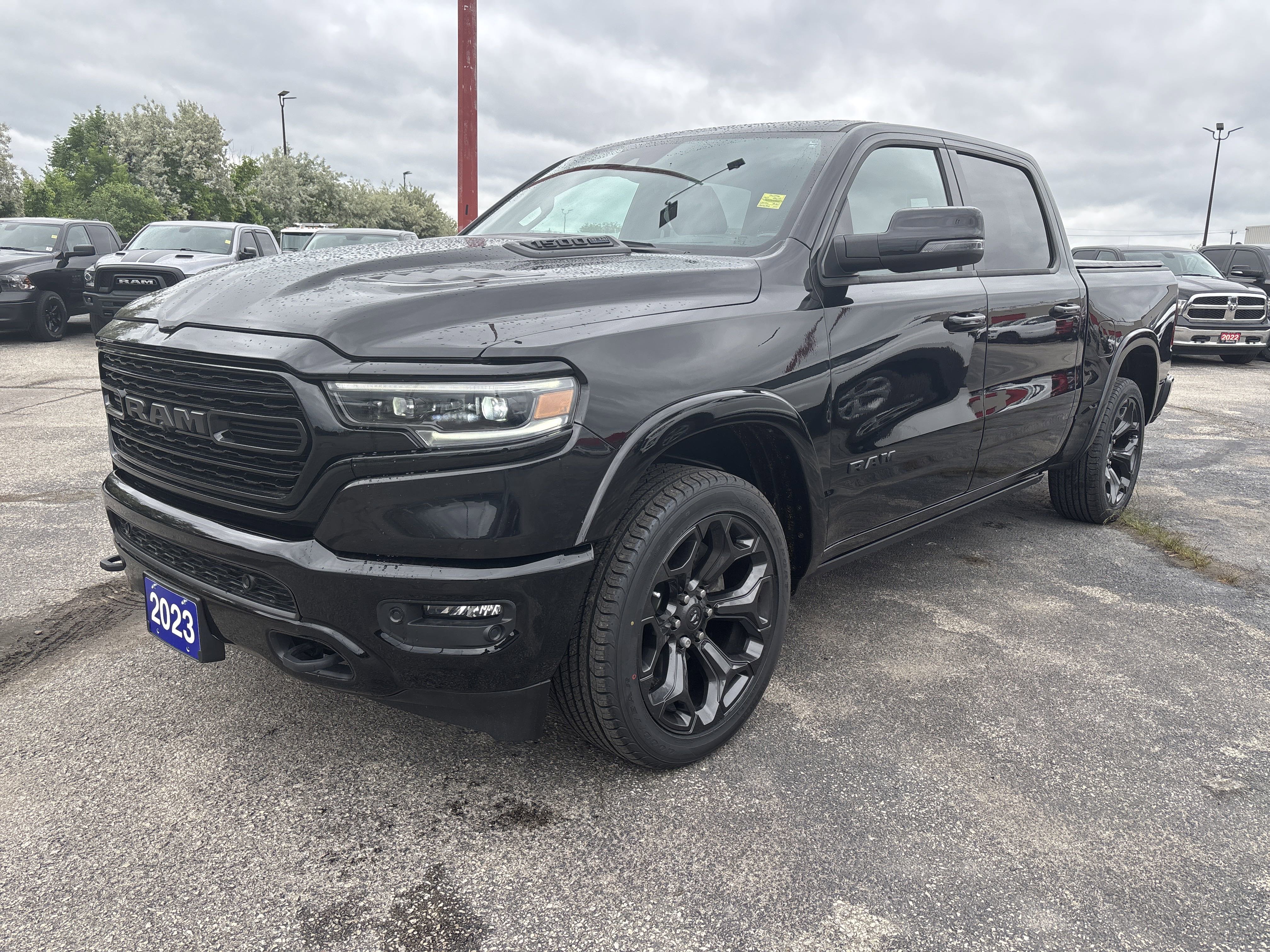 Used 2023 Diamond Black Crystal Pearl Ram Limited image 1